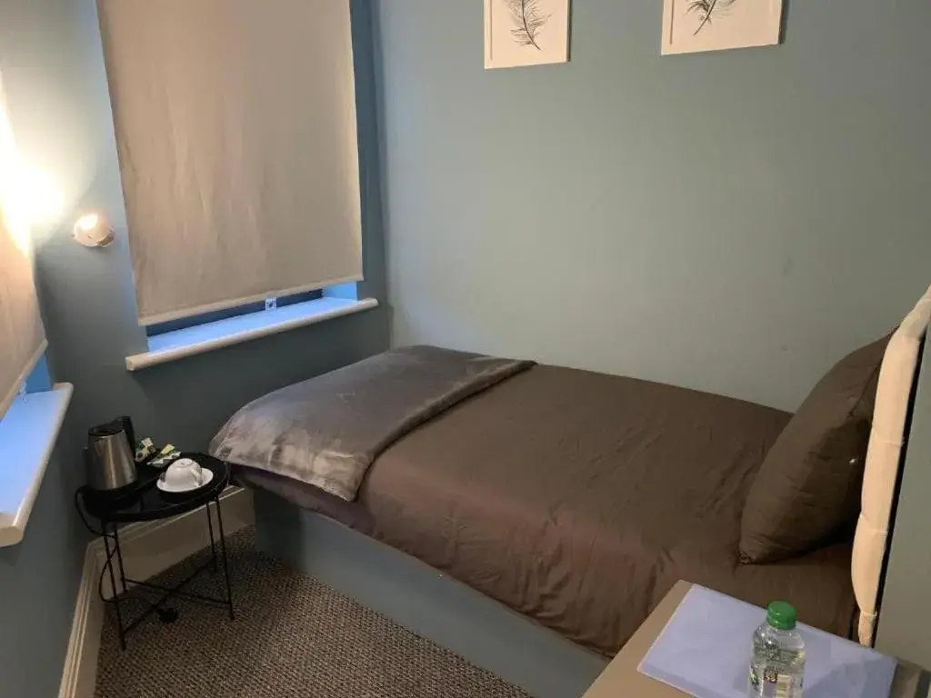 Bedroom, Bed in OYO Ruby Pub & Hotel Bedroom, Bed in OYO Ruby Pub & Hotel