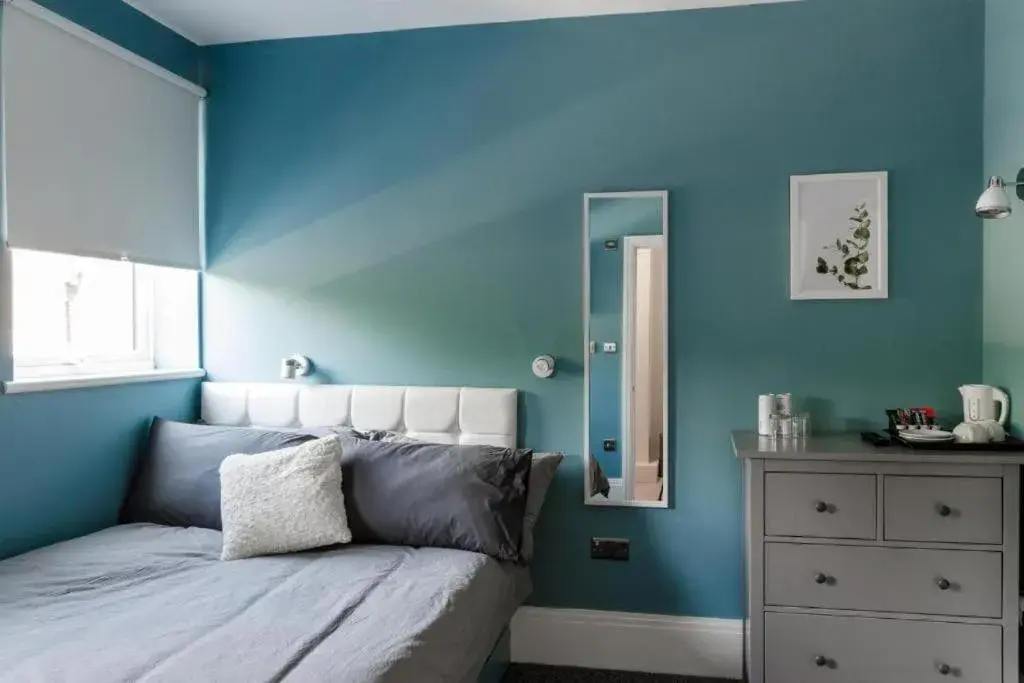 Bedroom, Bed in OYO Ruby Pub & Hotel Bedroom, Bed in OYO Ruby Pub & Hotel