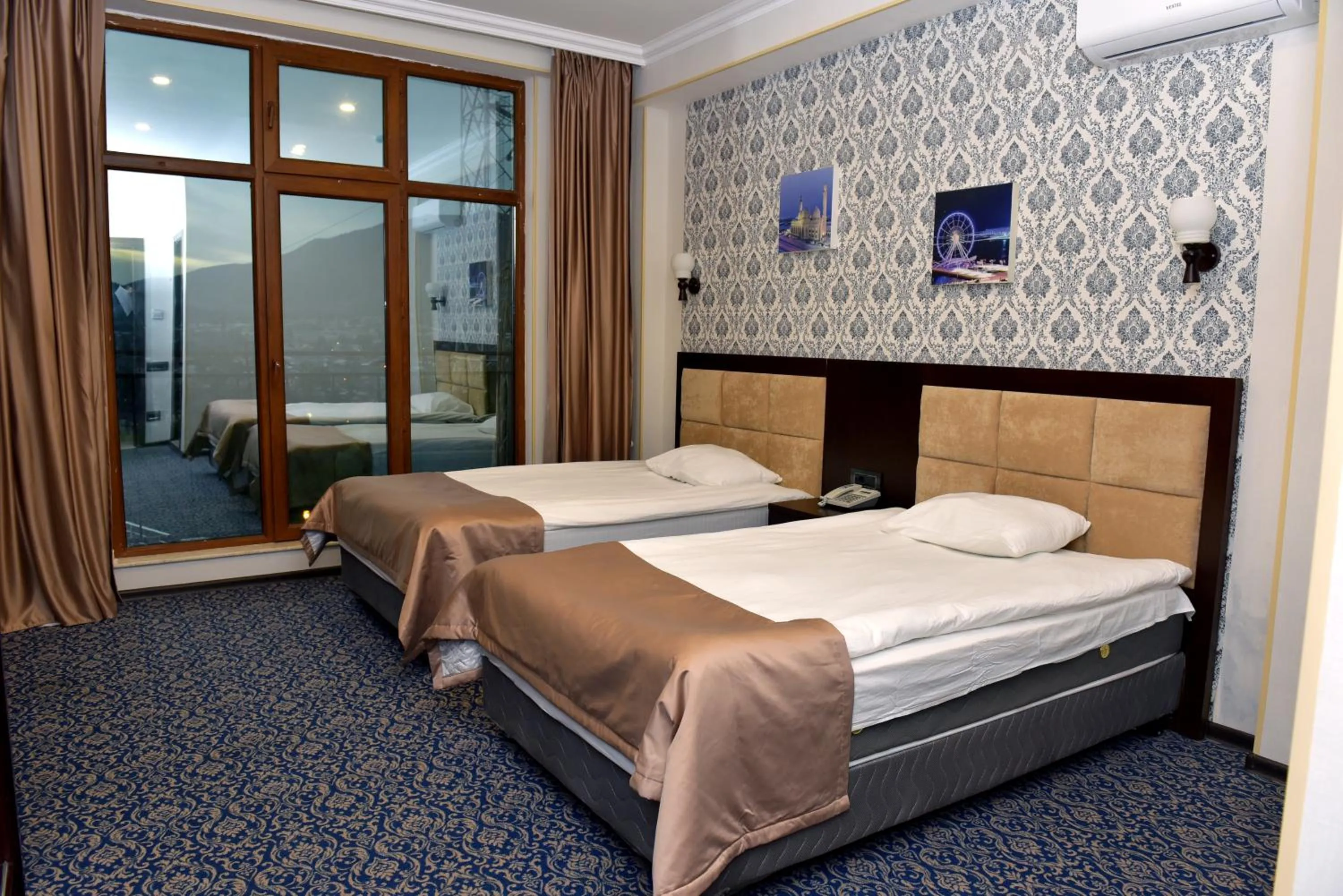 Bed in Ruma Qala Hotel