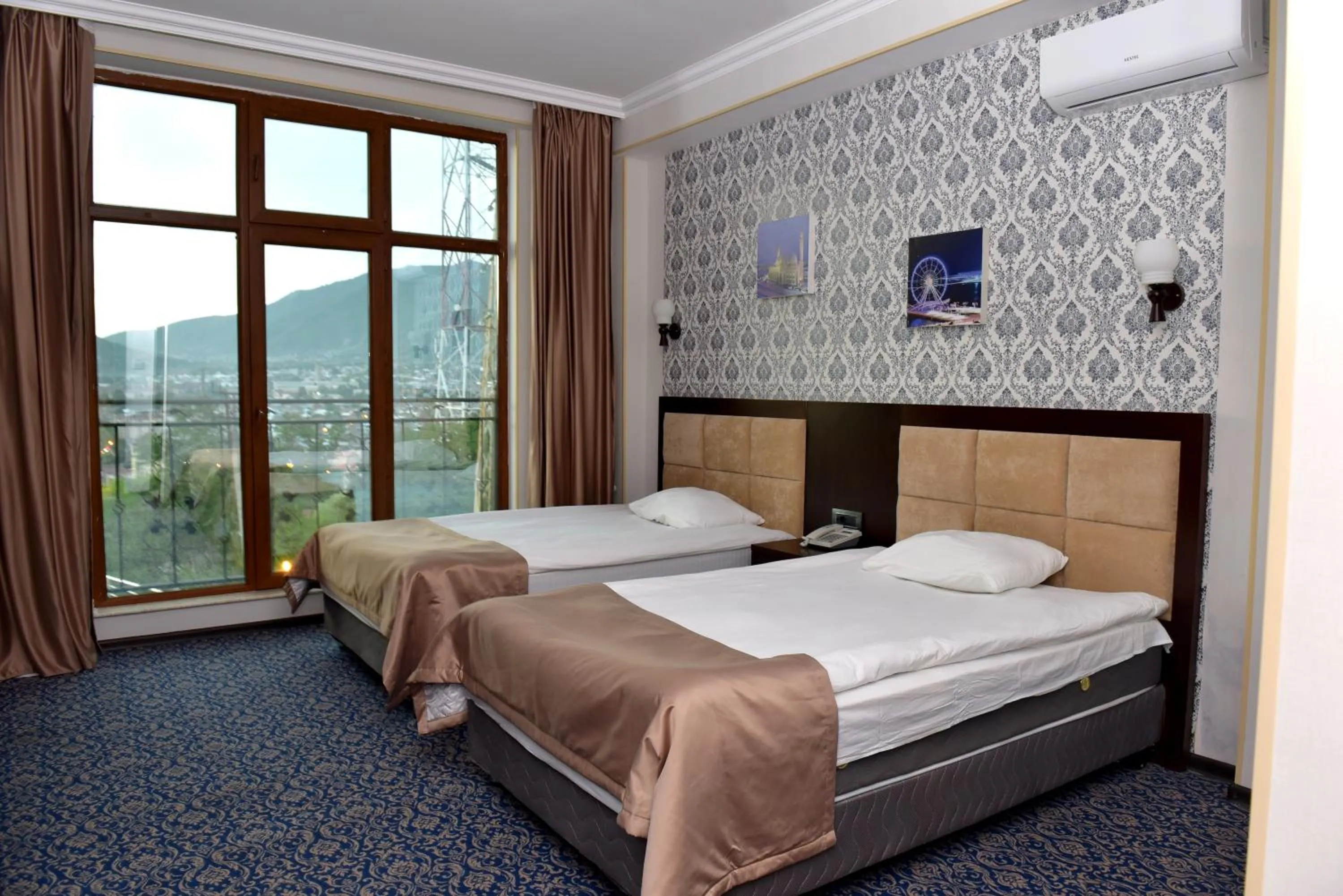 Photo of the whole room, Bed in Ruma Qala Hotel