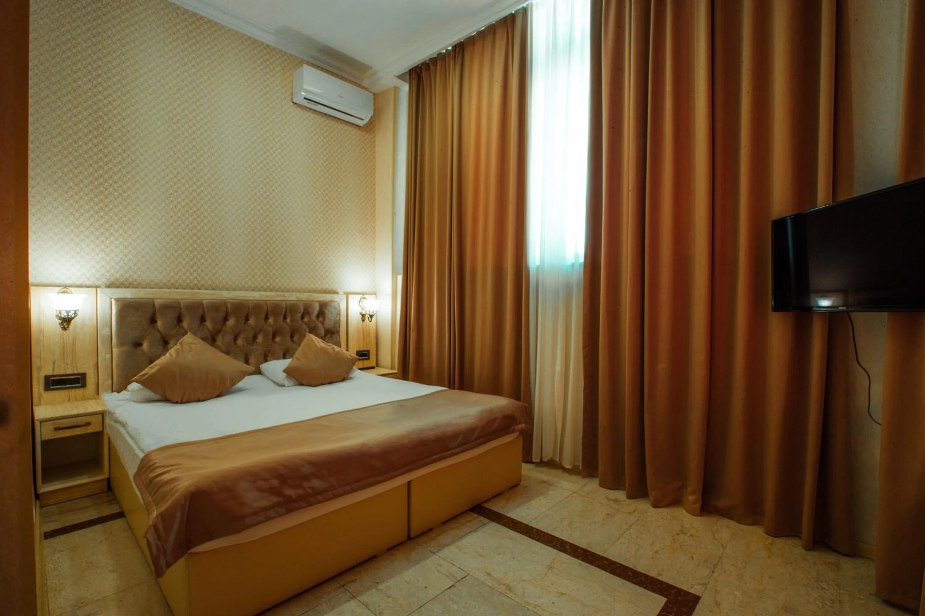 Bathroom, Bed in Ruma Qala Hotel