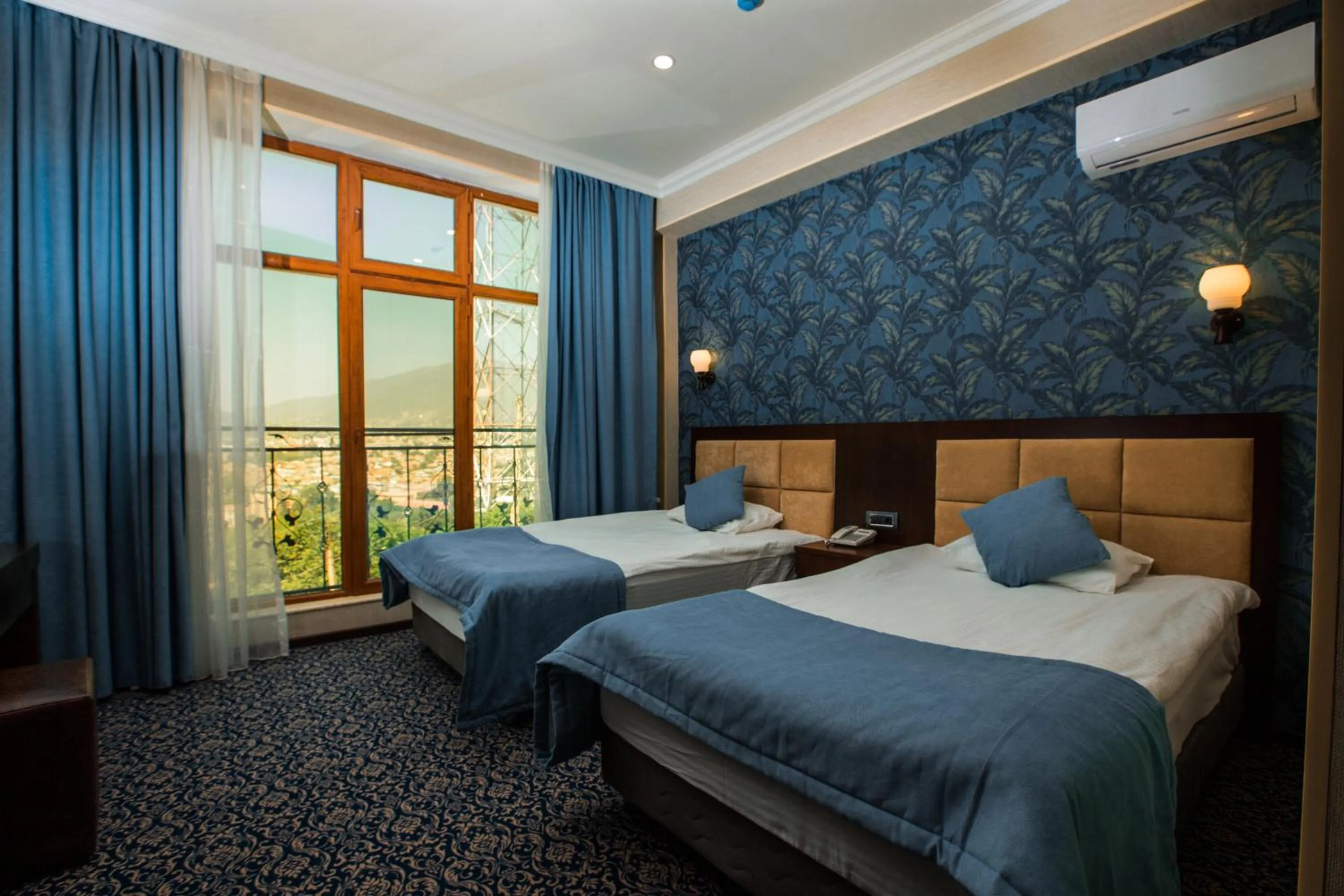 Photo of the whole room, Bed in Ruma Qala Hotel