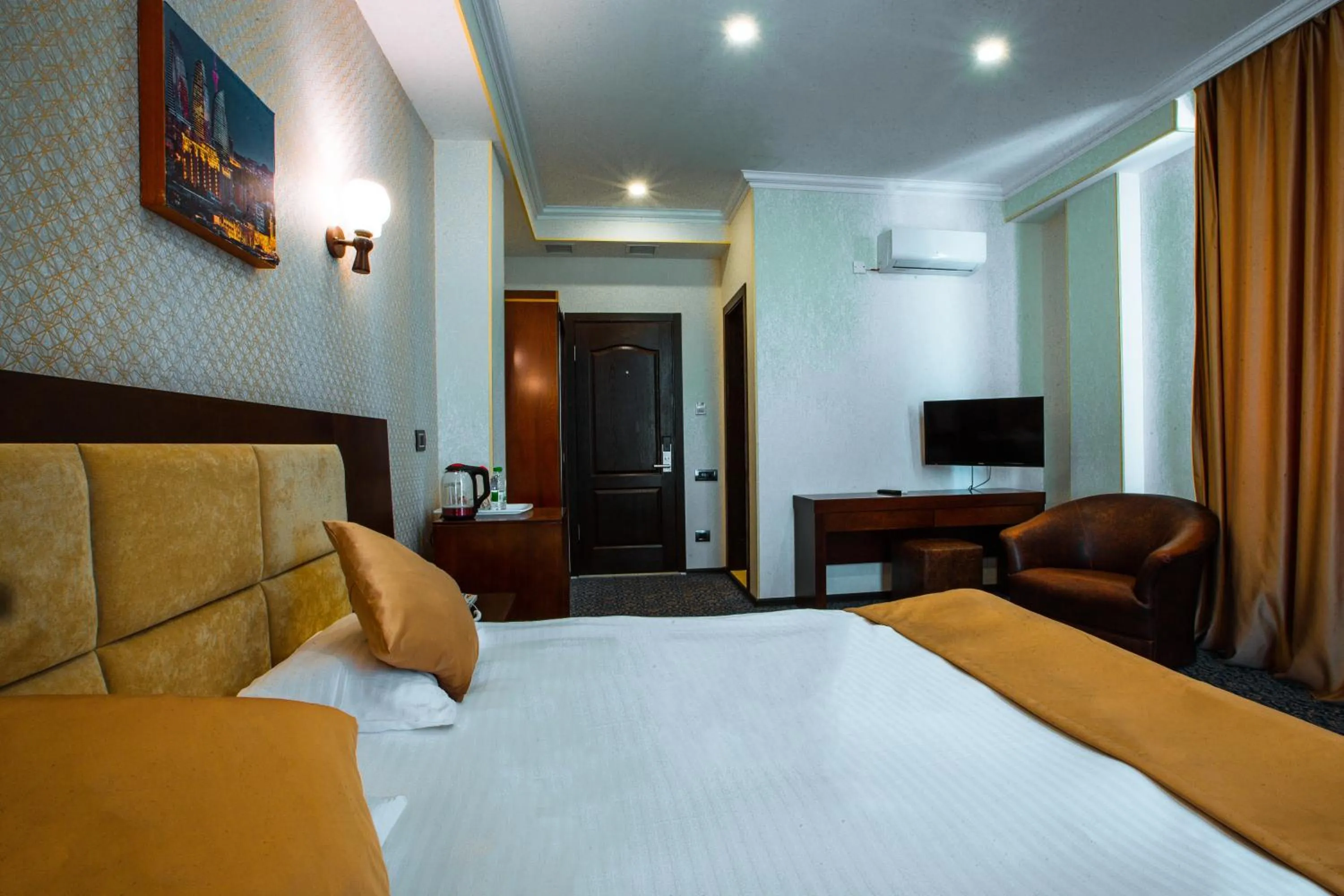Photo of the whole room, Bed in Ruma Qala Hotel