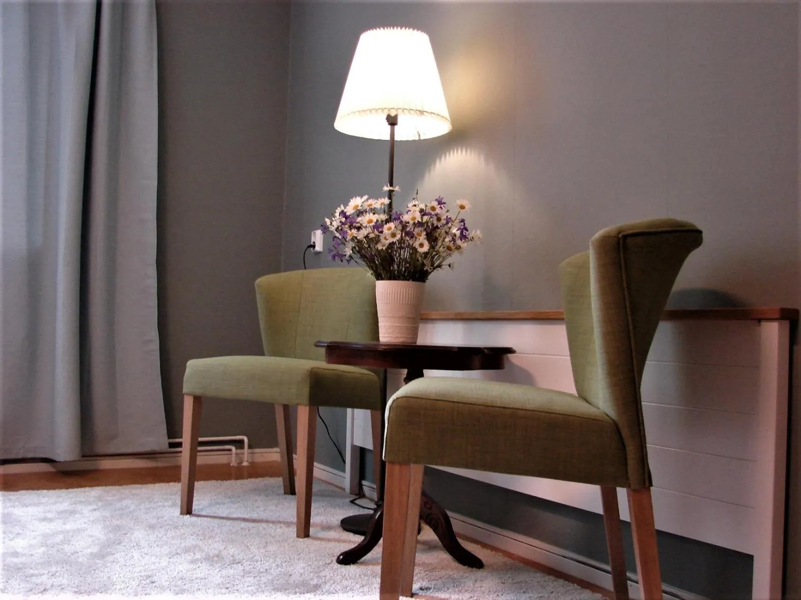 Seating area in Sjugare Gård Bed & Breakfast