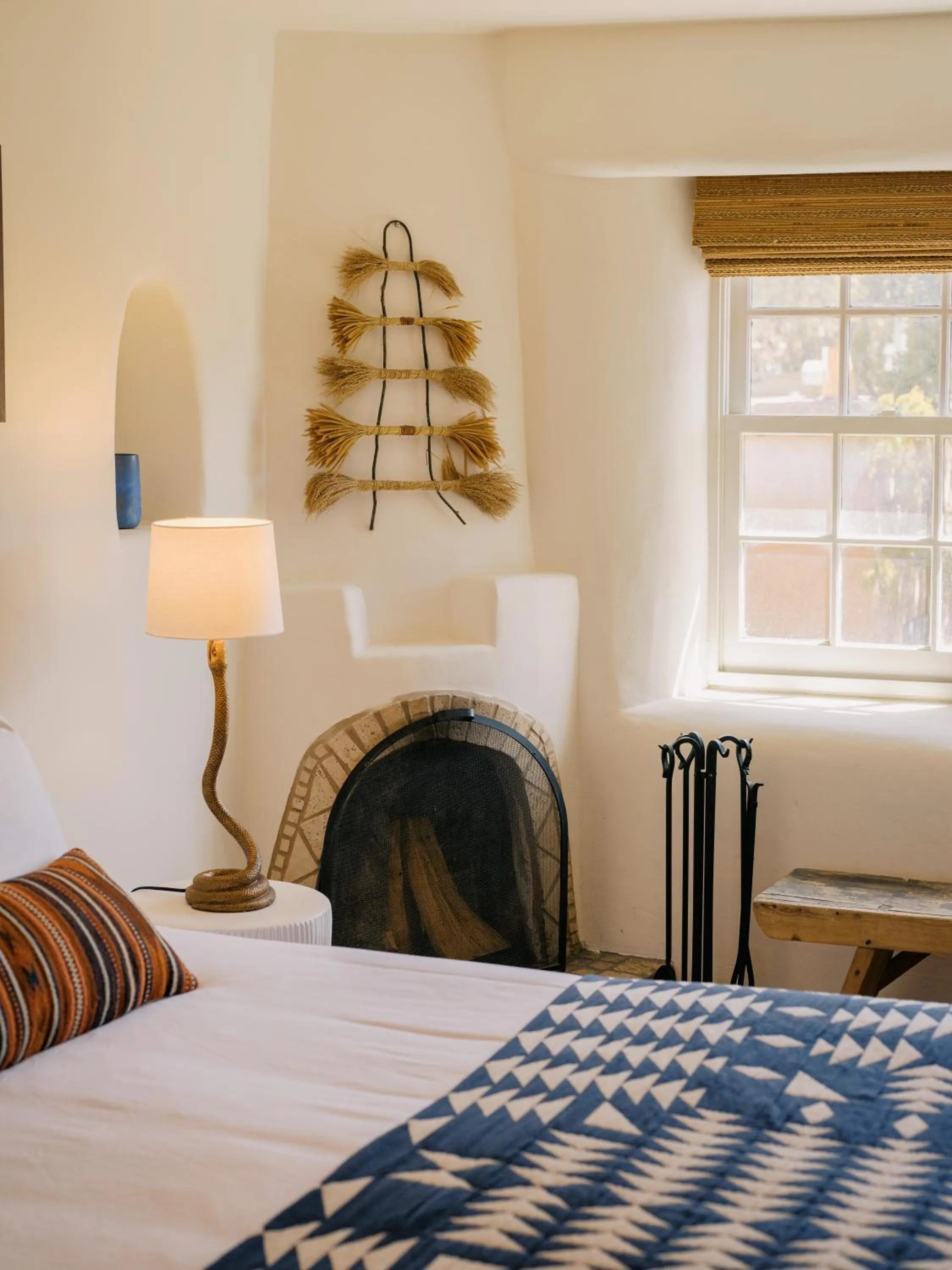 Decorative detail, Bed in Pueblo Bonito Inn