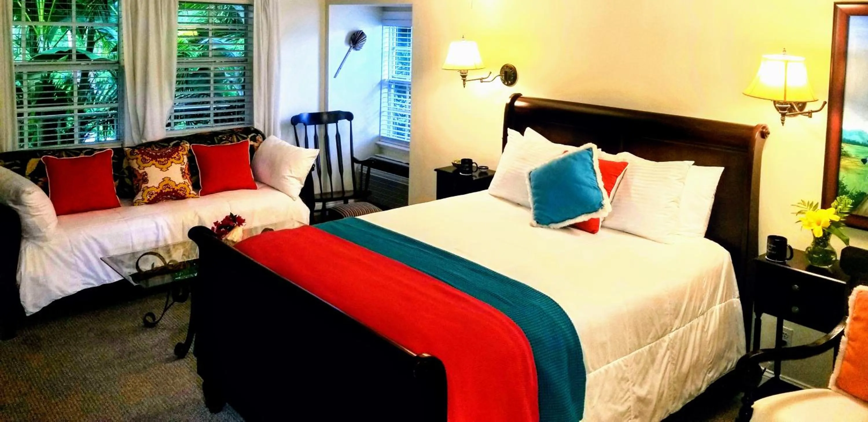 Bed in The Caribbean Court Boutique Hotel