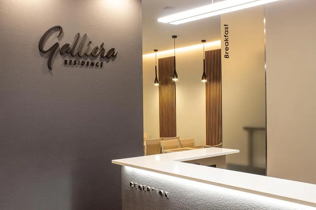 Communal kitchen in Galliera Residence B&B