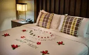 Bed in Khanom Beach Resort And Spa Bed in Khanom Beach Resort And Spa