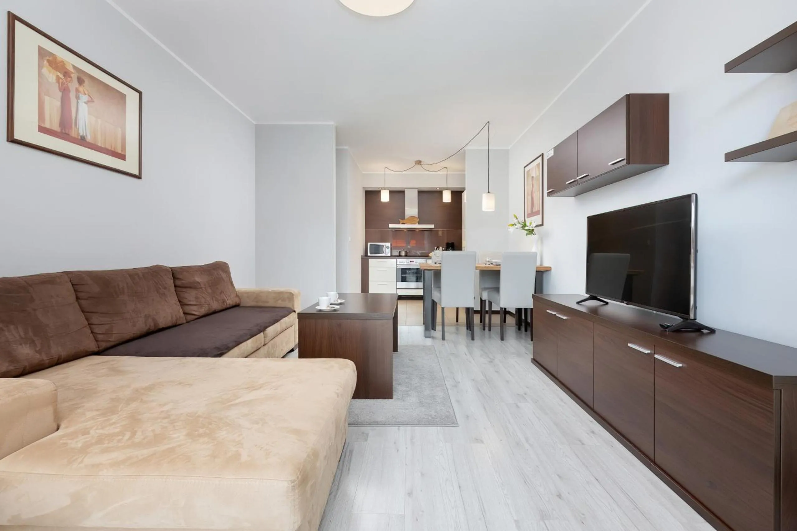 Communal lounge/ TV room in Apartamenty Aquarius by Noclegi Renters