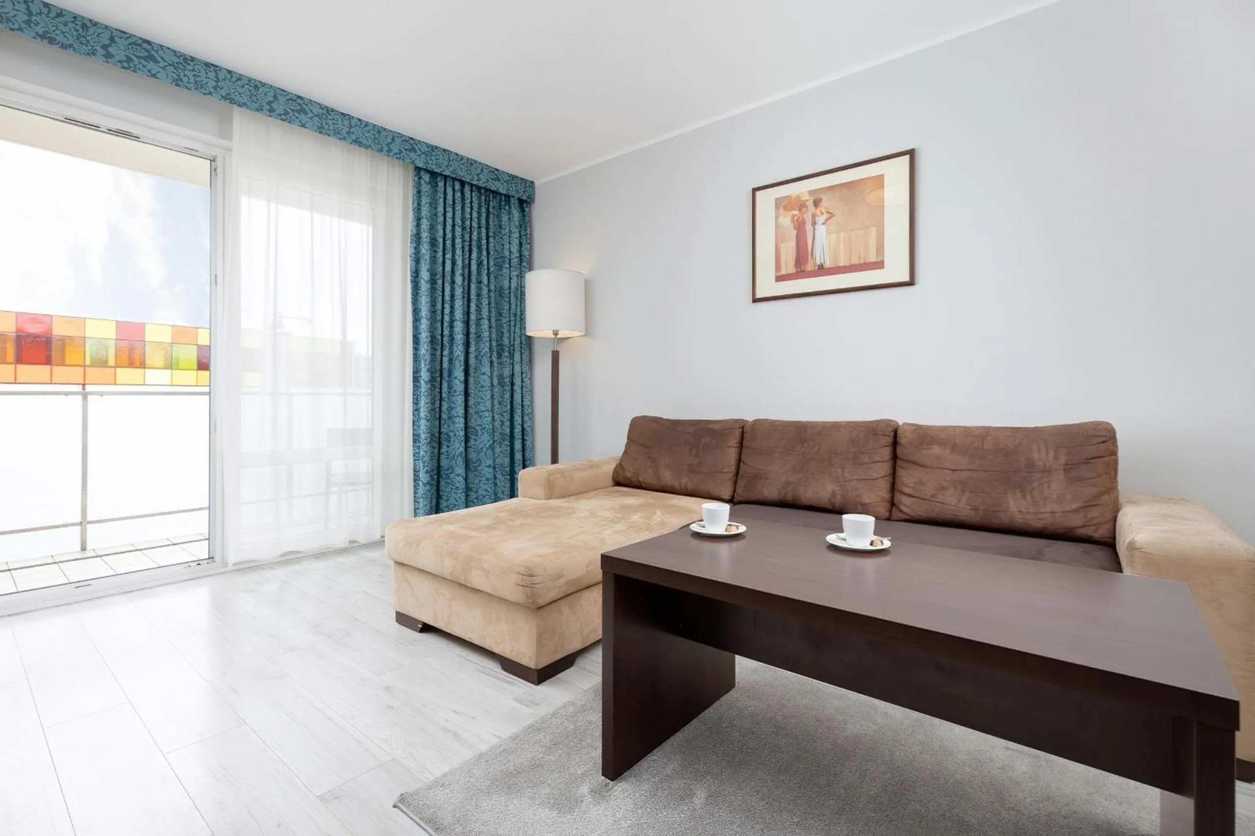Communal lounge/ TV room in Apartamenty Aquarius by Noclegi Renters