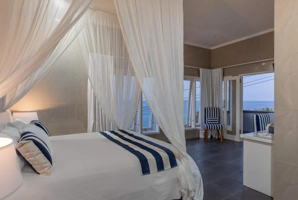 Bed in Bayu Cottages