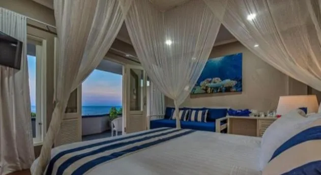 Bed in Bayu Cottages