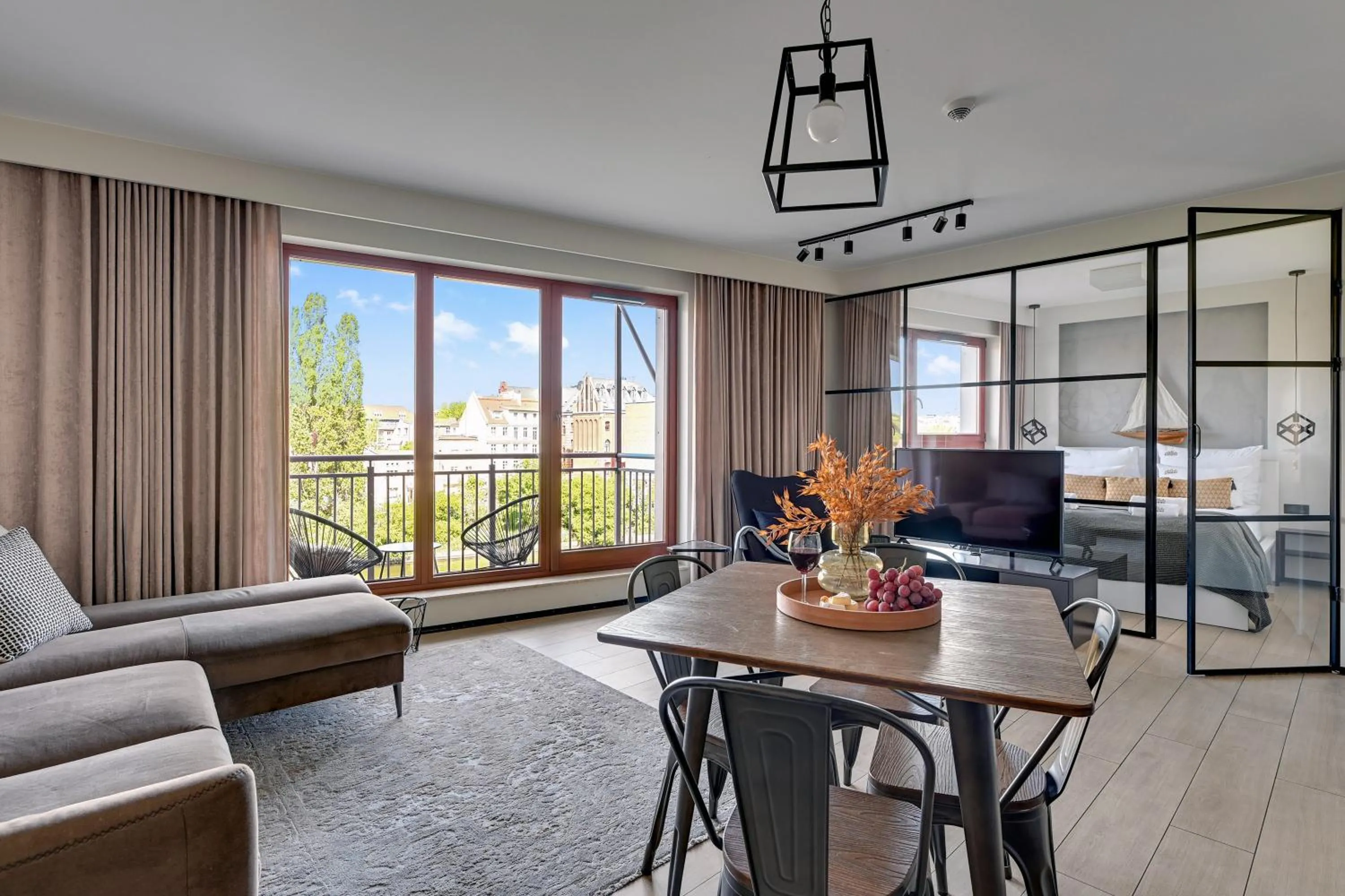 TV and multimedia in Waterlane Island - Riverview Pool, SPA, Gym & Parking by Downtown Apartments