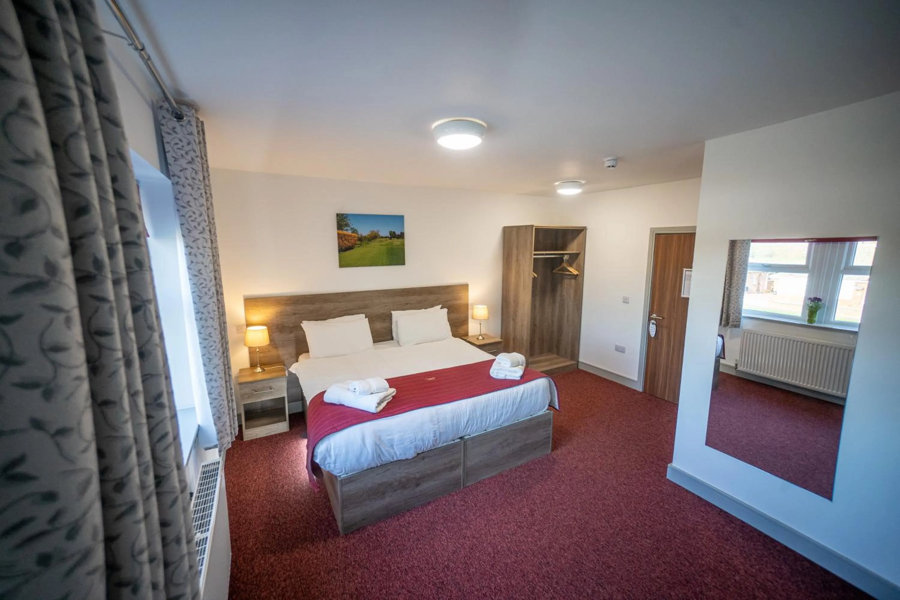 Bed in Belvedere Hotel and Golf