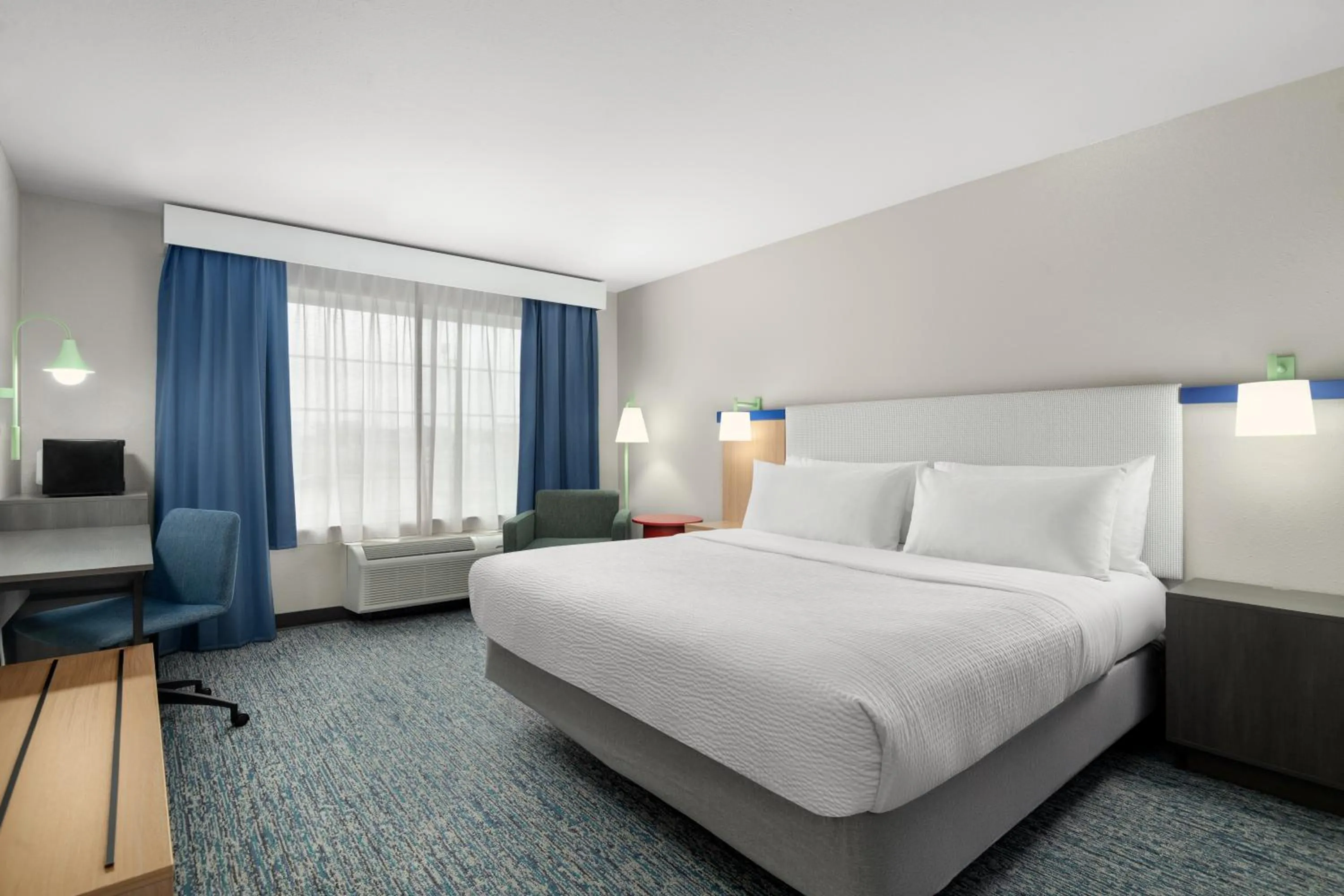 Bed in Garner Hotel Madison - Huntsville Airport by IHG