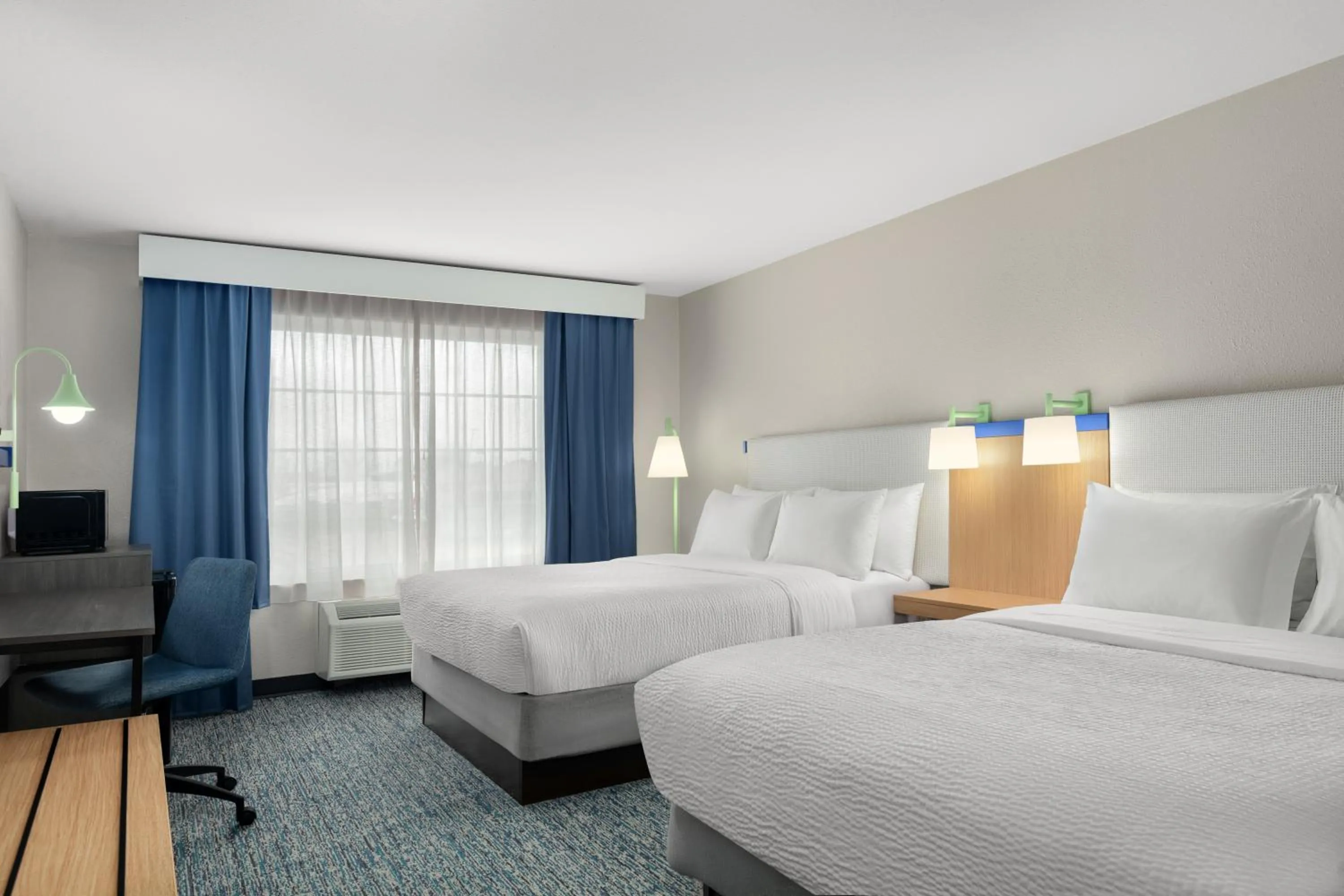 Bed in Garner Hotel Madison - Huntsville Airport by IHG