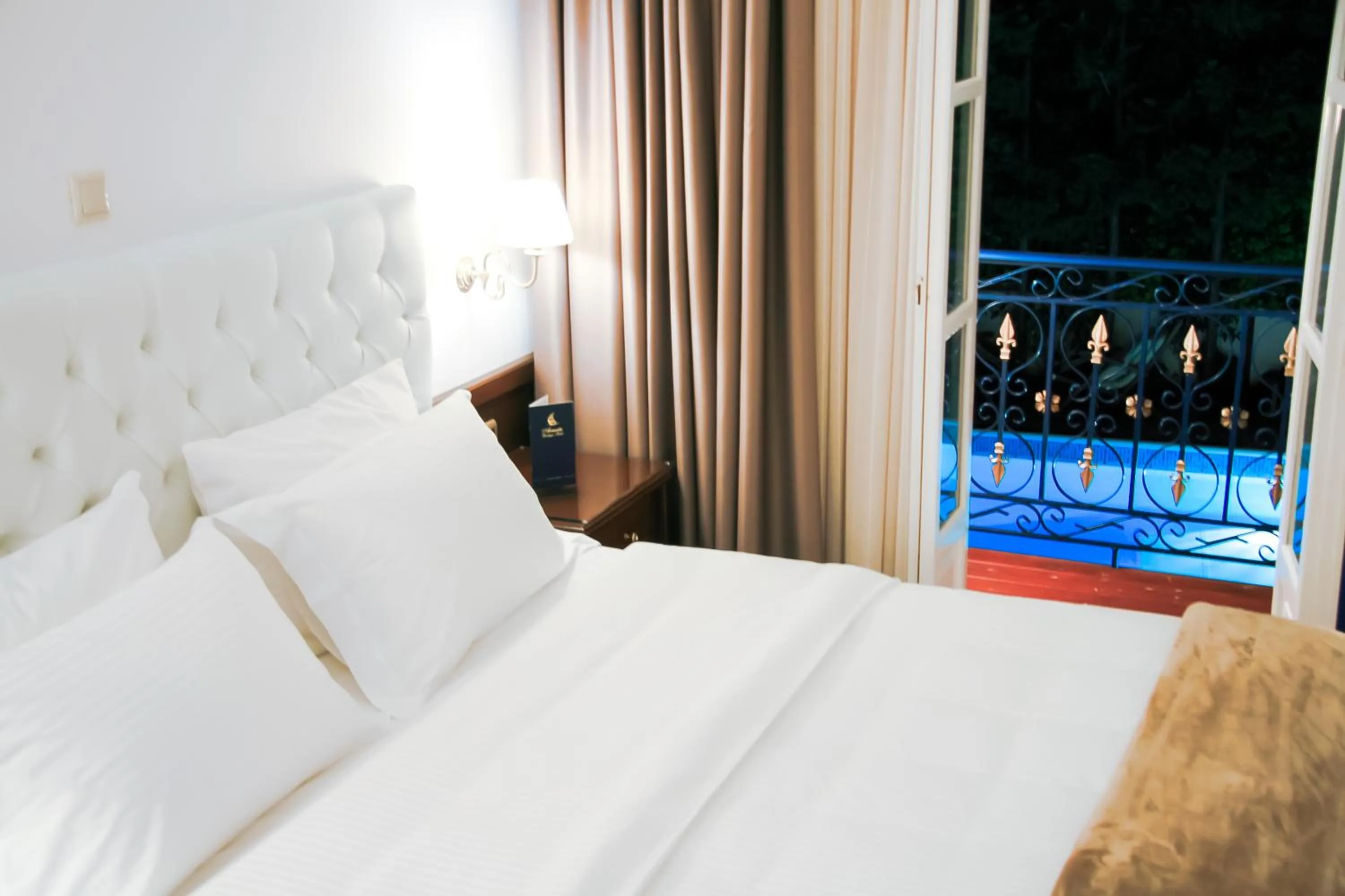 Bed in Armata Boutique Hotel