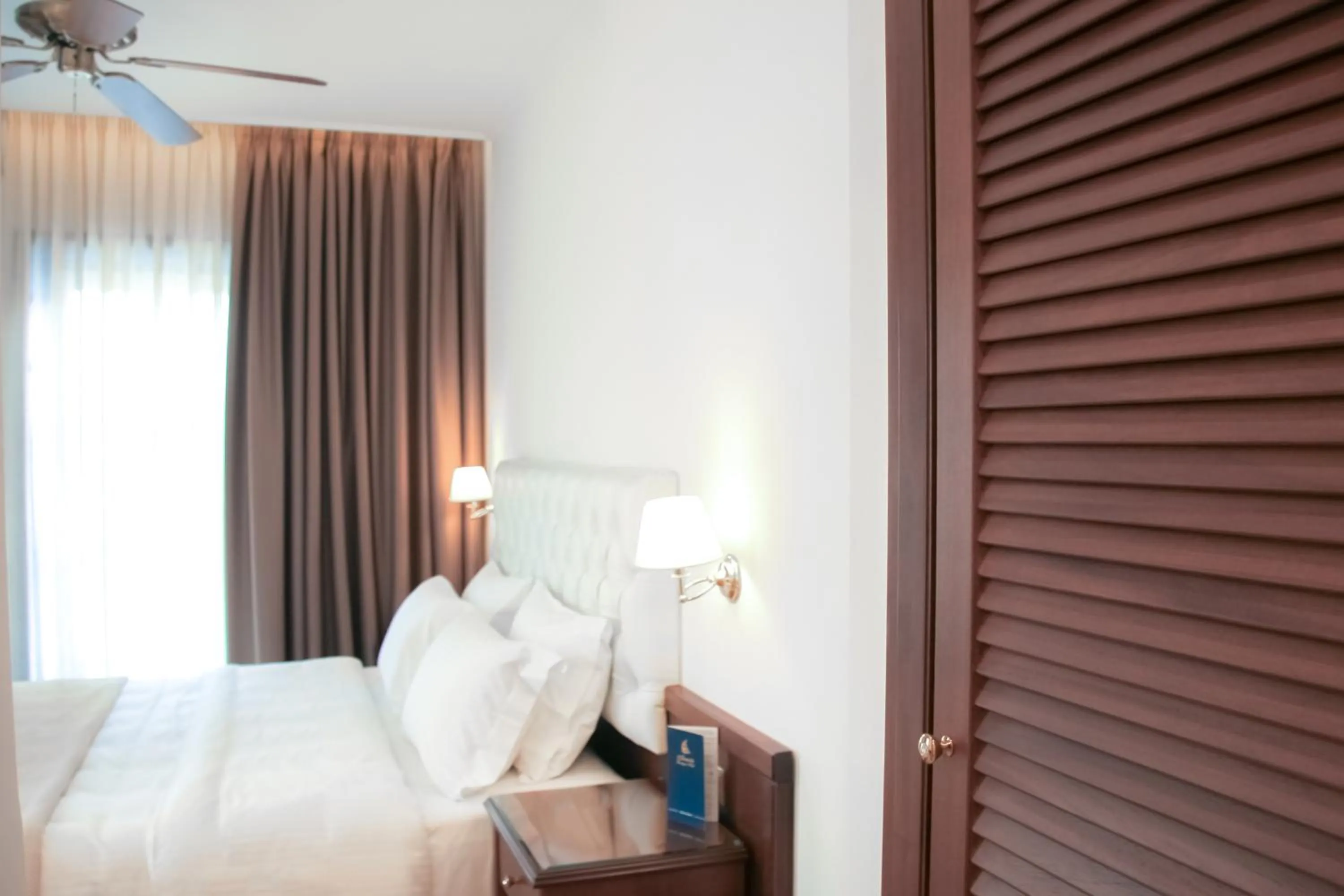 Bed in Armata Boutique Hotel