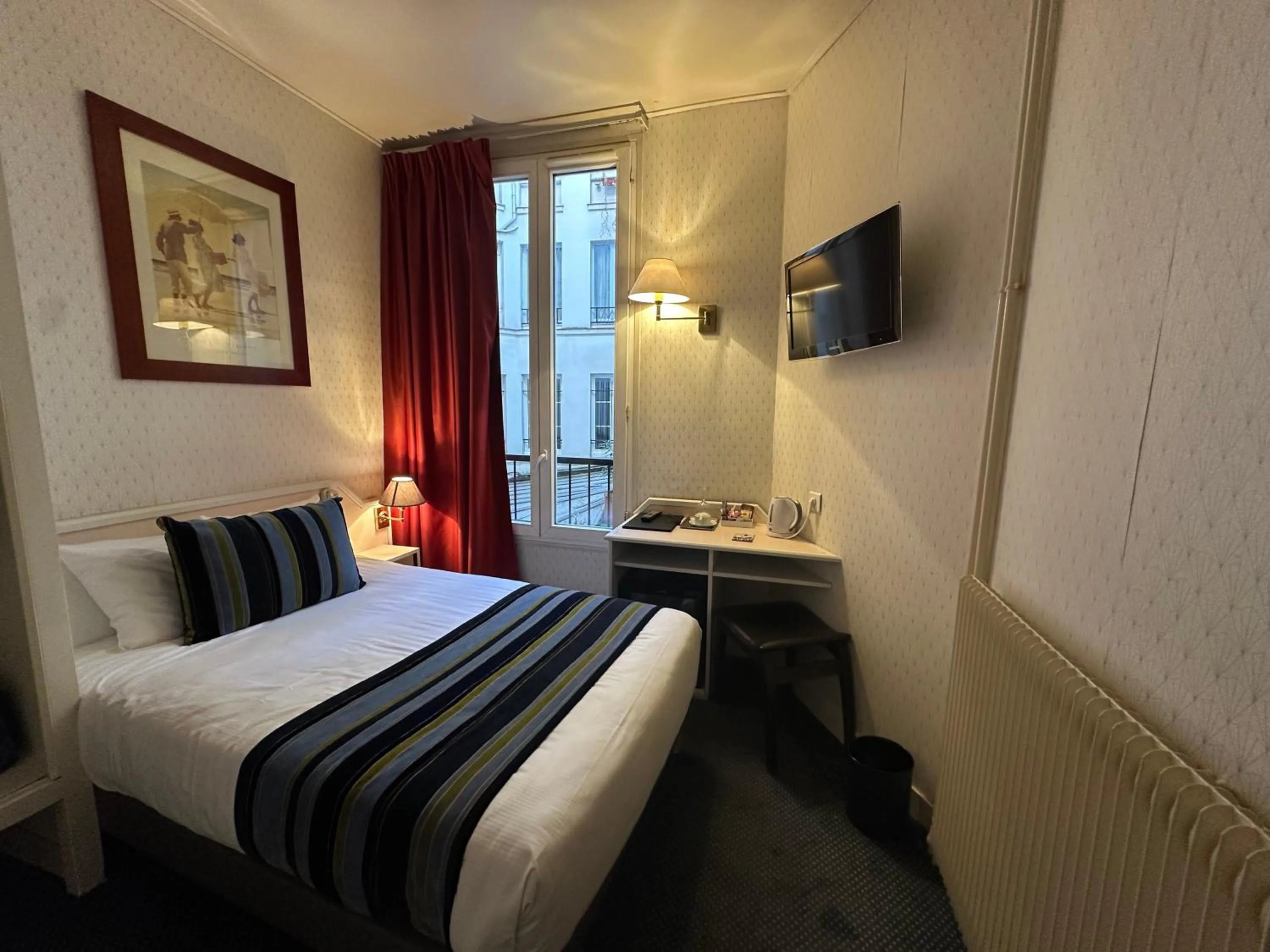 Bed in Hôtel Opera Deauville