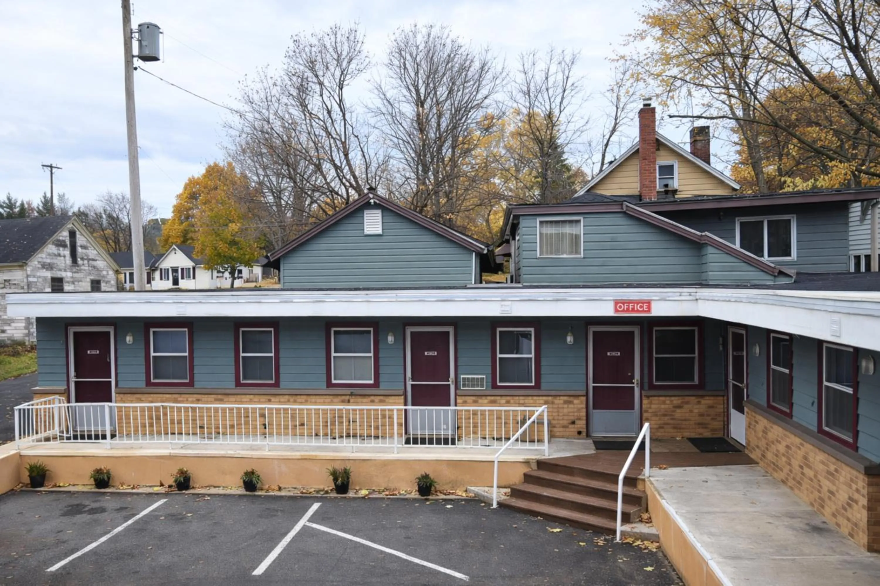 Property building in Economy Inn Cadillac MI by Hotel O