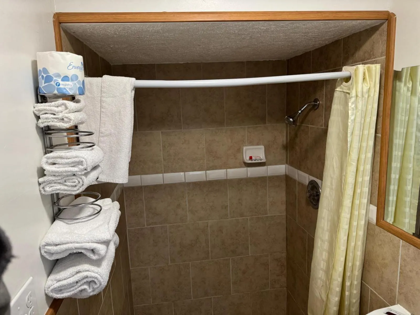 Bathroom in Economy Inn Cadillac MI by Hotel O