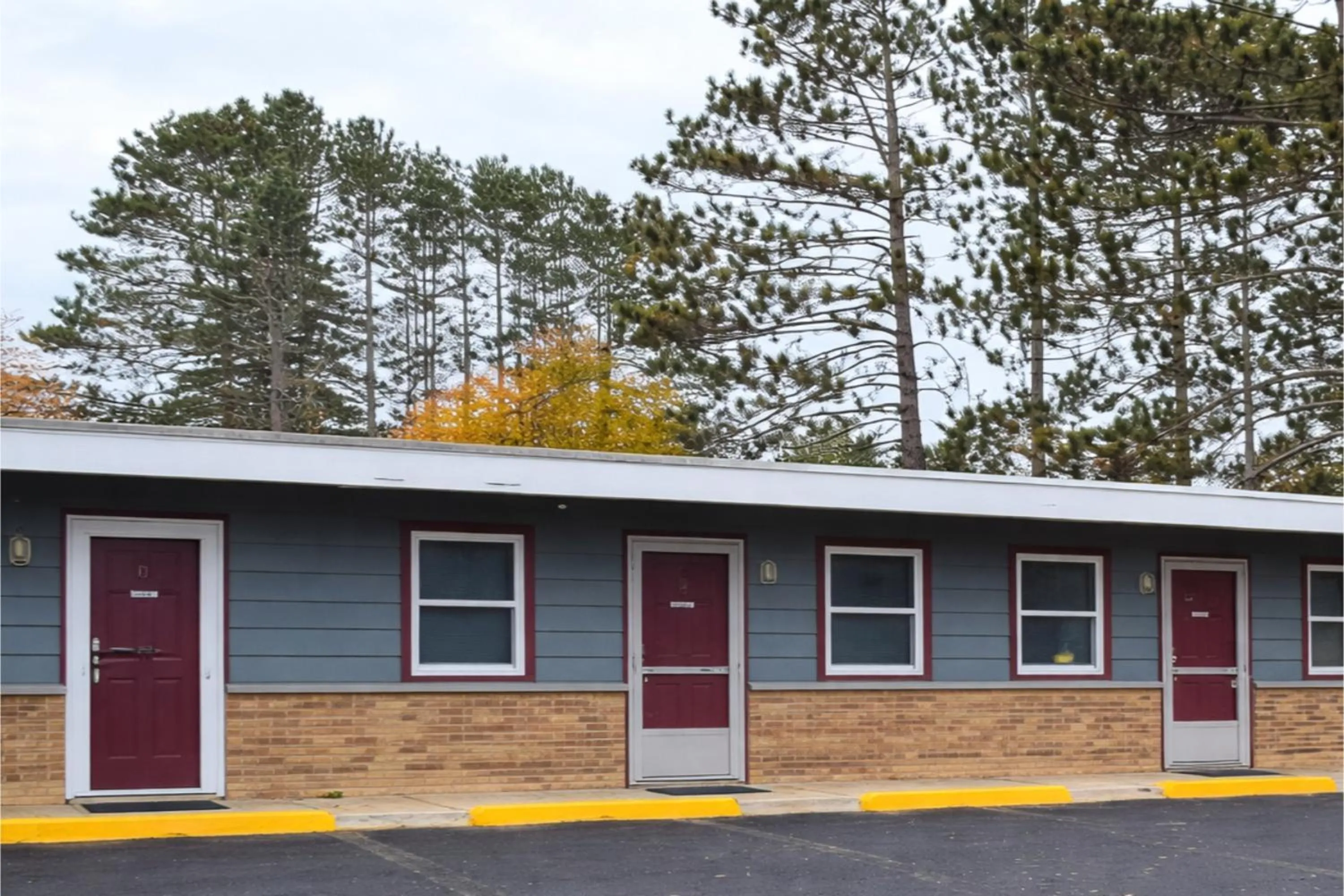 Property building in Economy Inn Cadillac MI by Hotel O