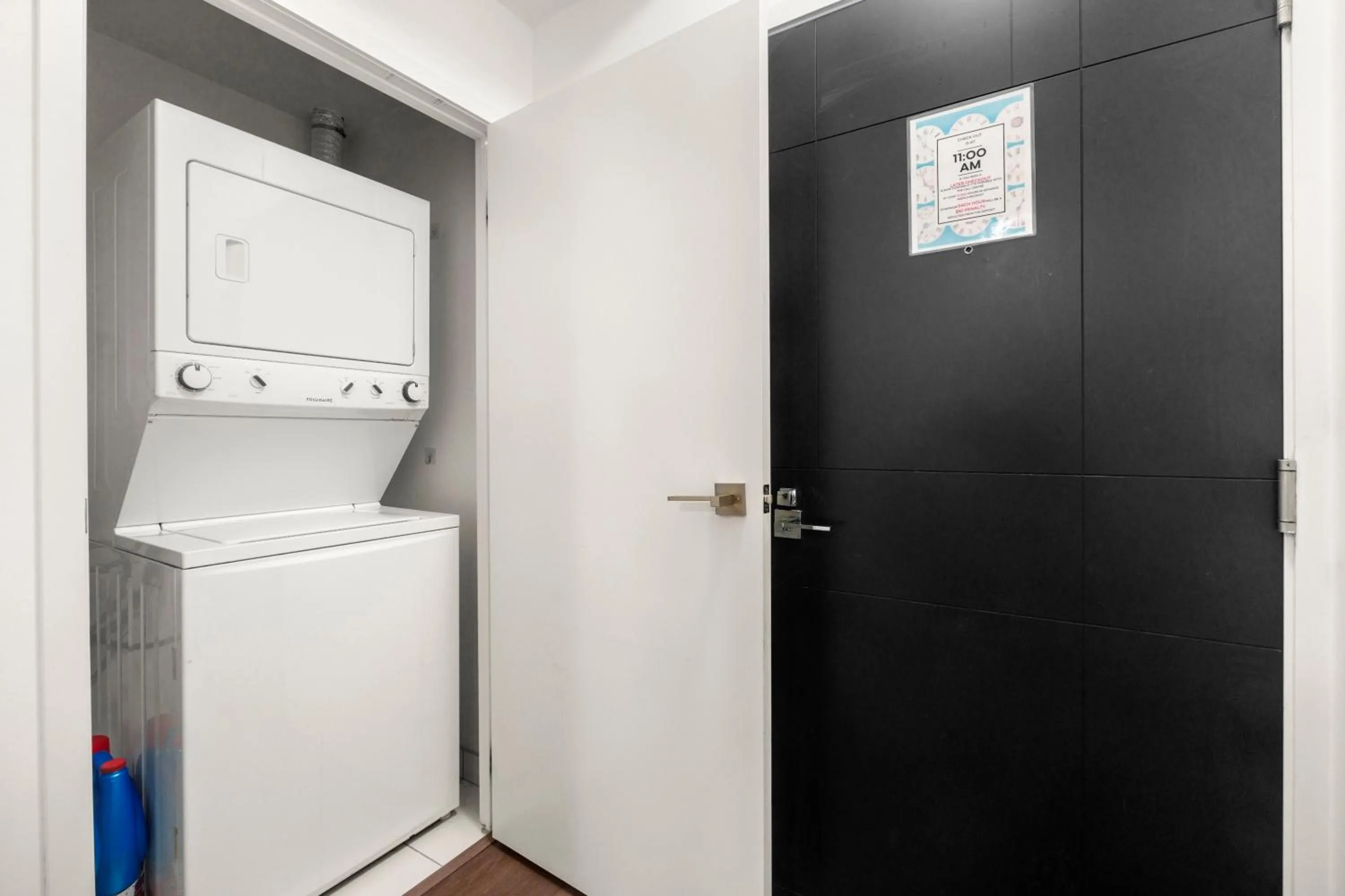 washing machine in Modern Lillian St Apartments by GLOBALSTAY