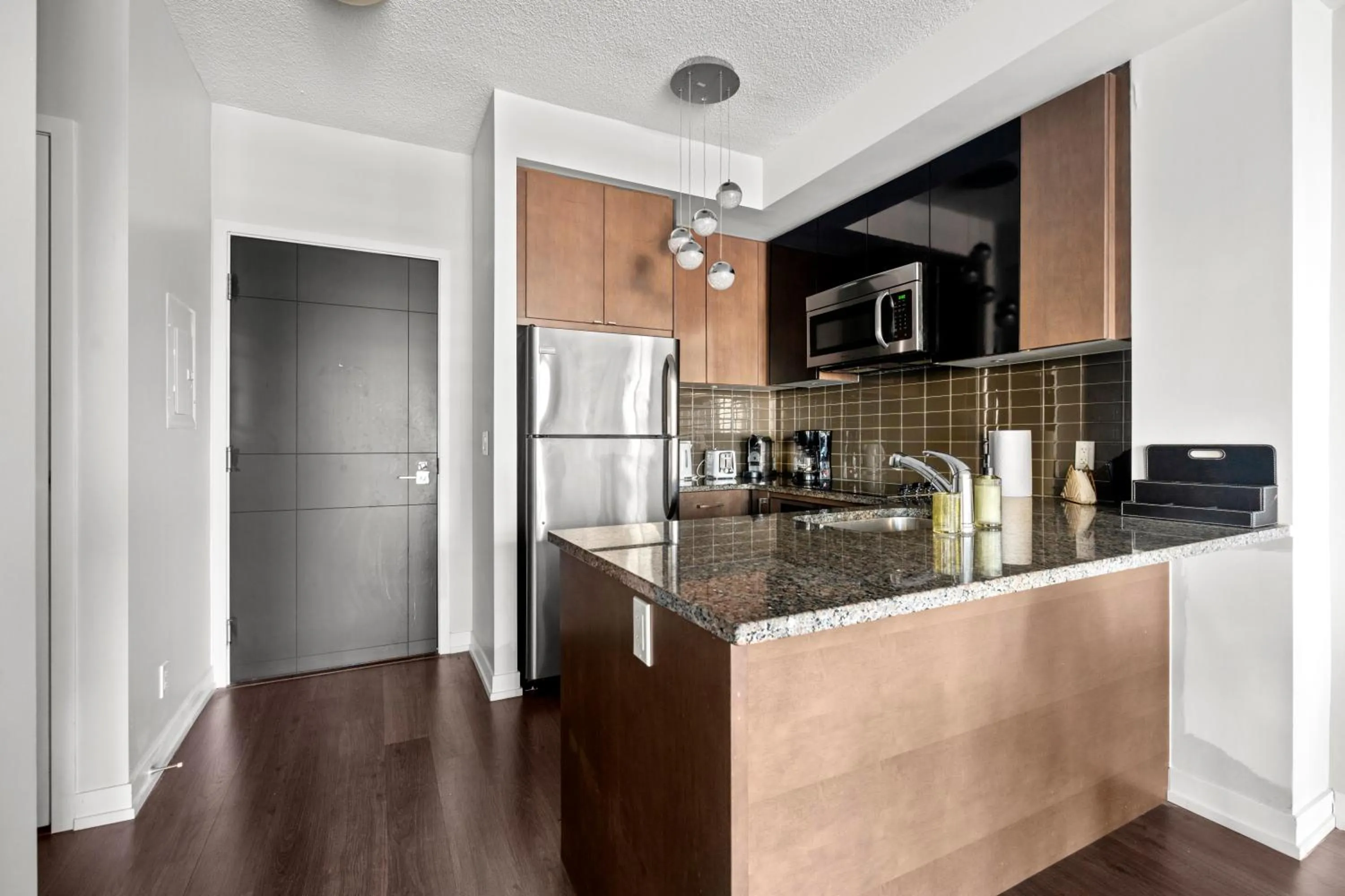 Kitchen or kitchenette in Modern Lillian St Apartments by GLOBALSTAY