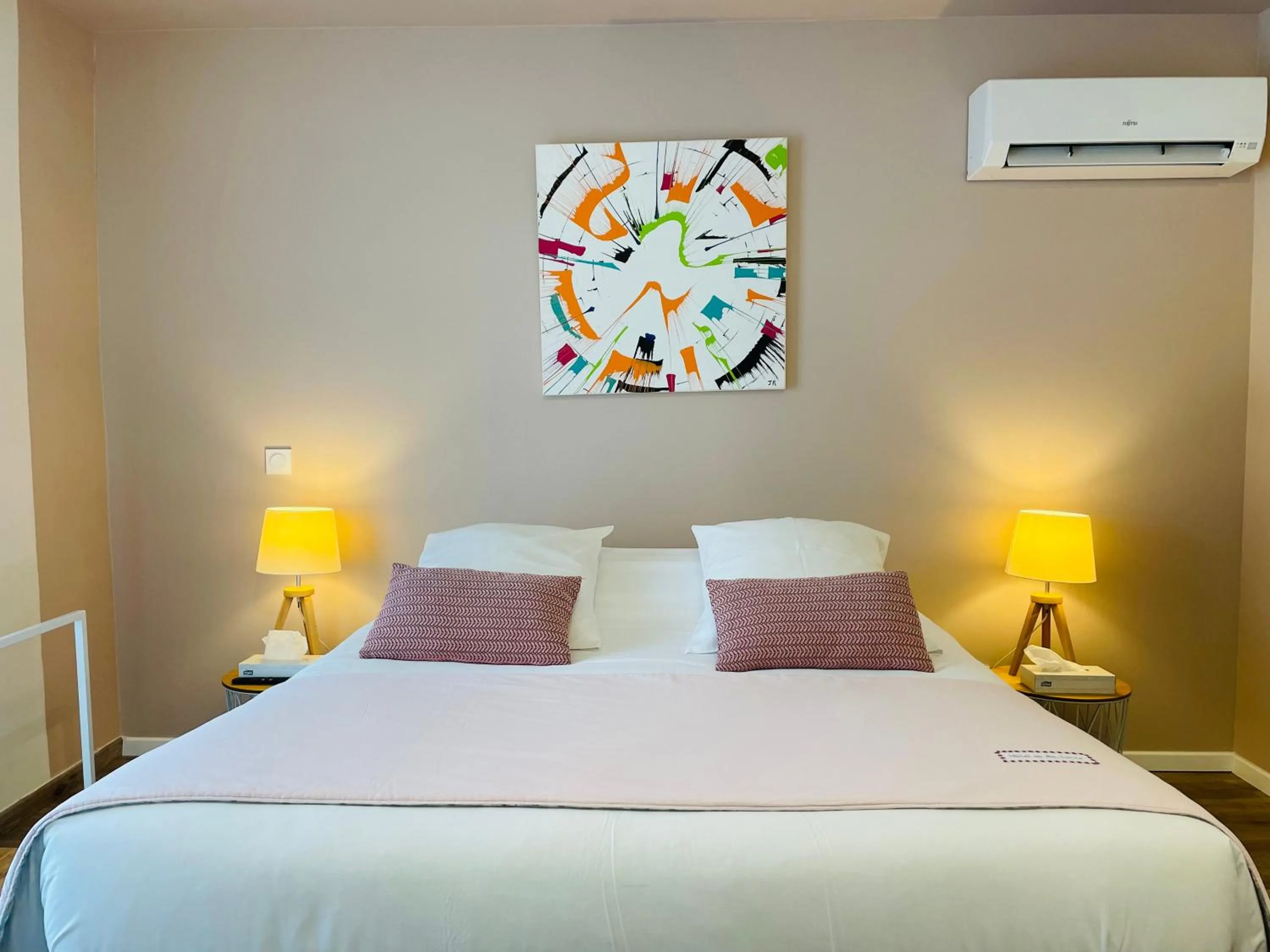 Bed in Hotel De Ma Tante