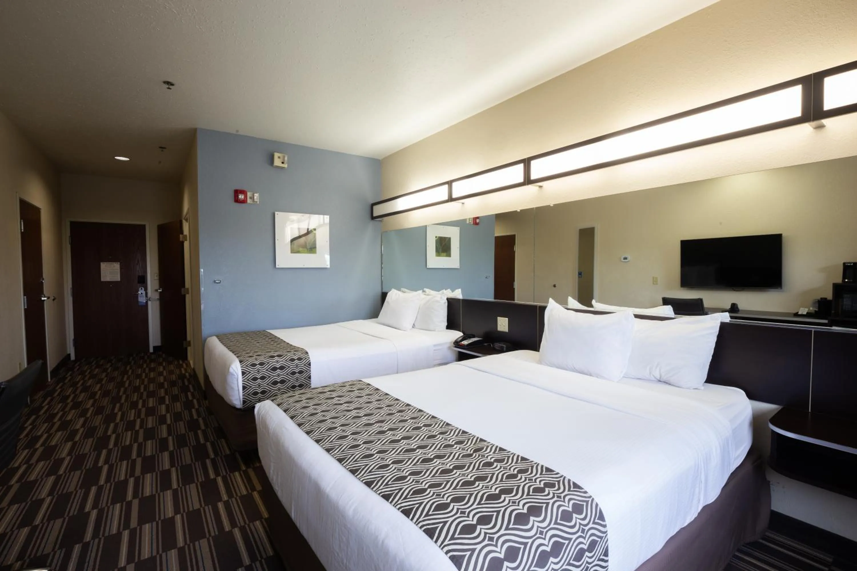 Bed in Microtel Inn & Suites by Wyndham Waynesburg