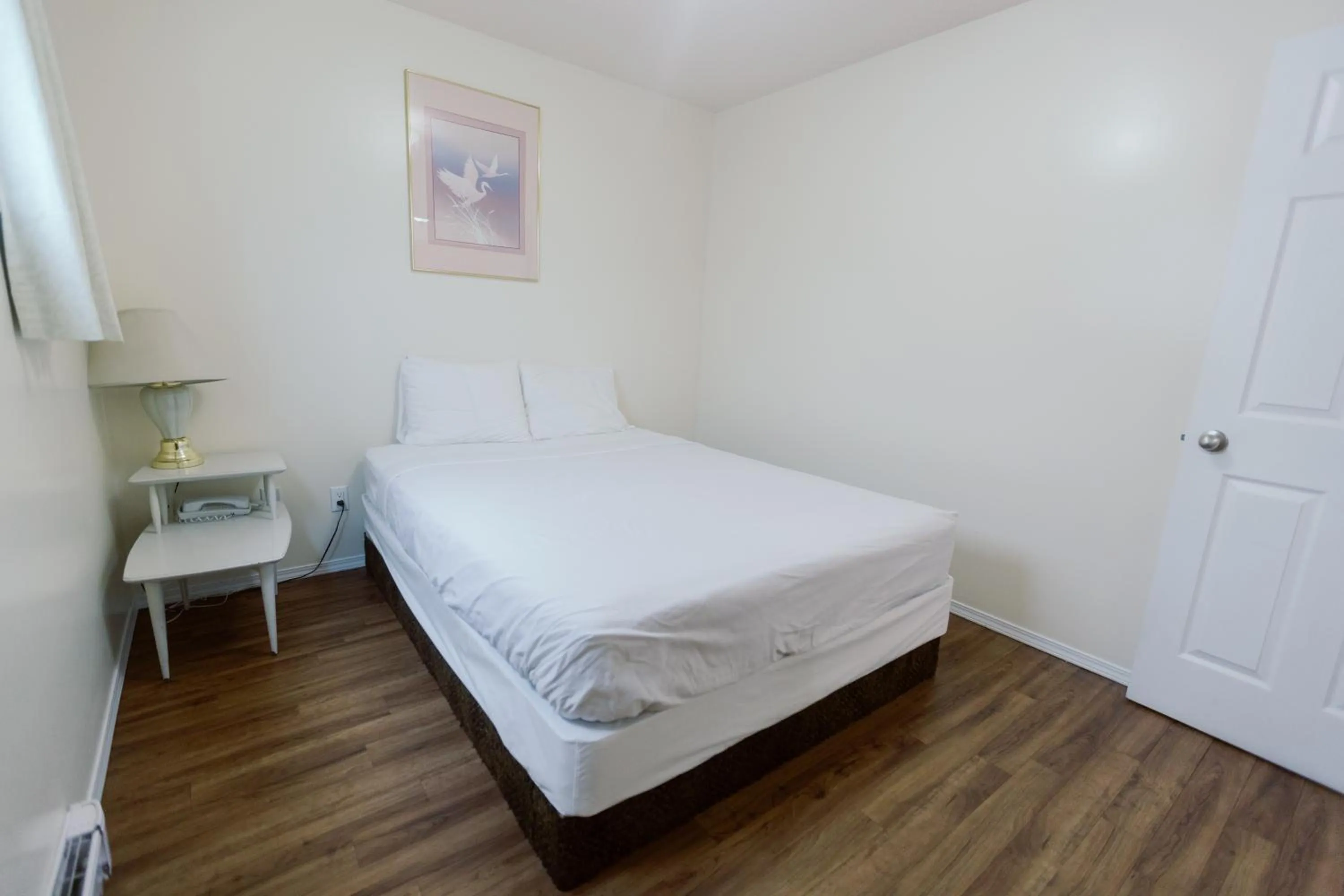 Bed in Beachside Motel