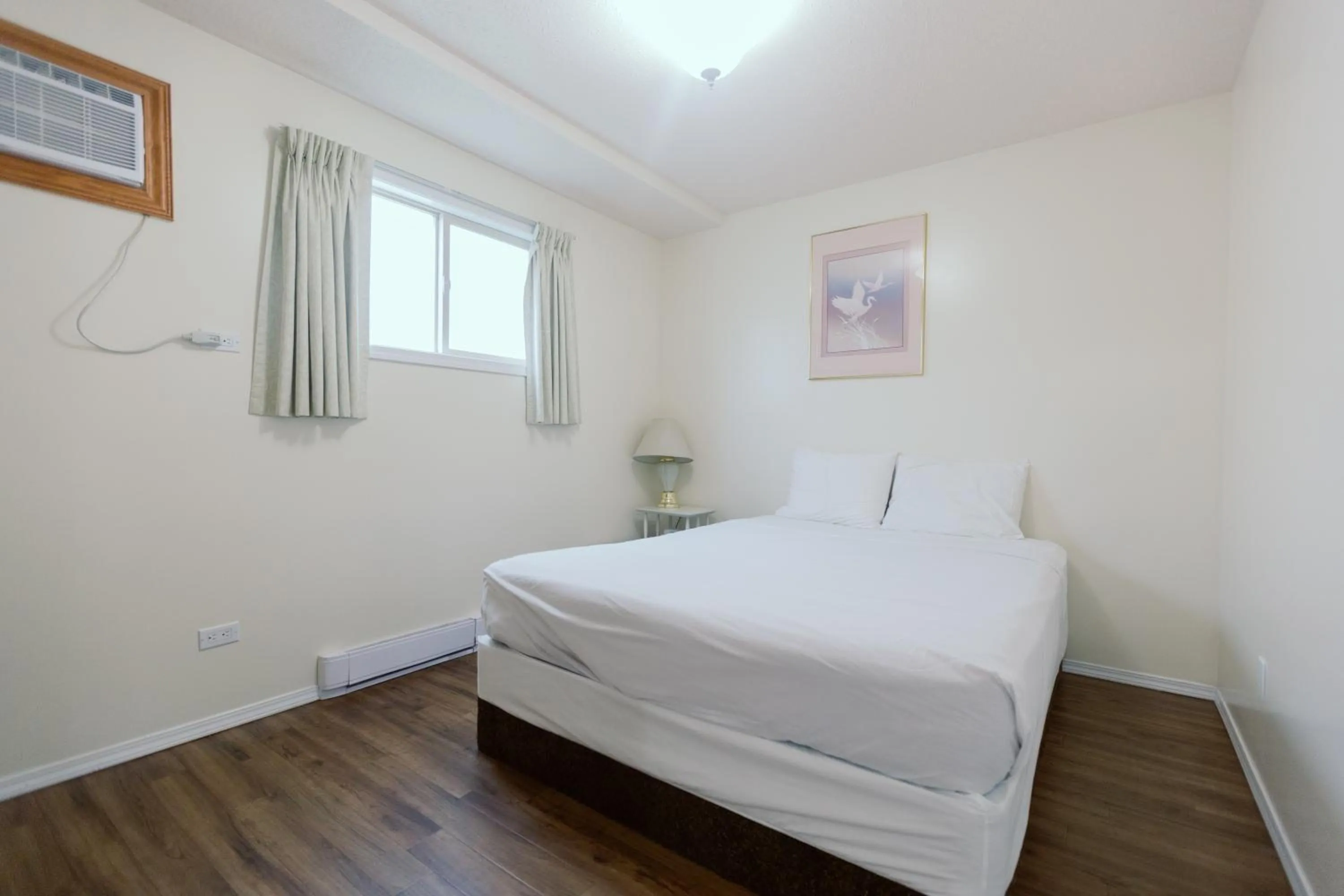 Bed in Beachside Motel