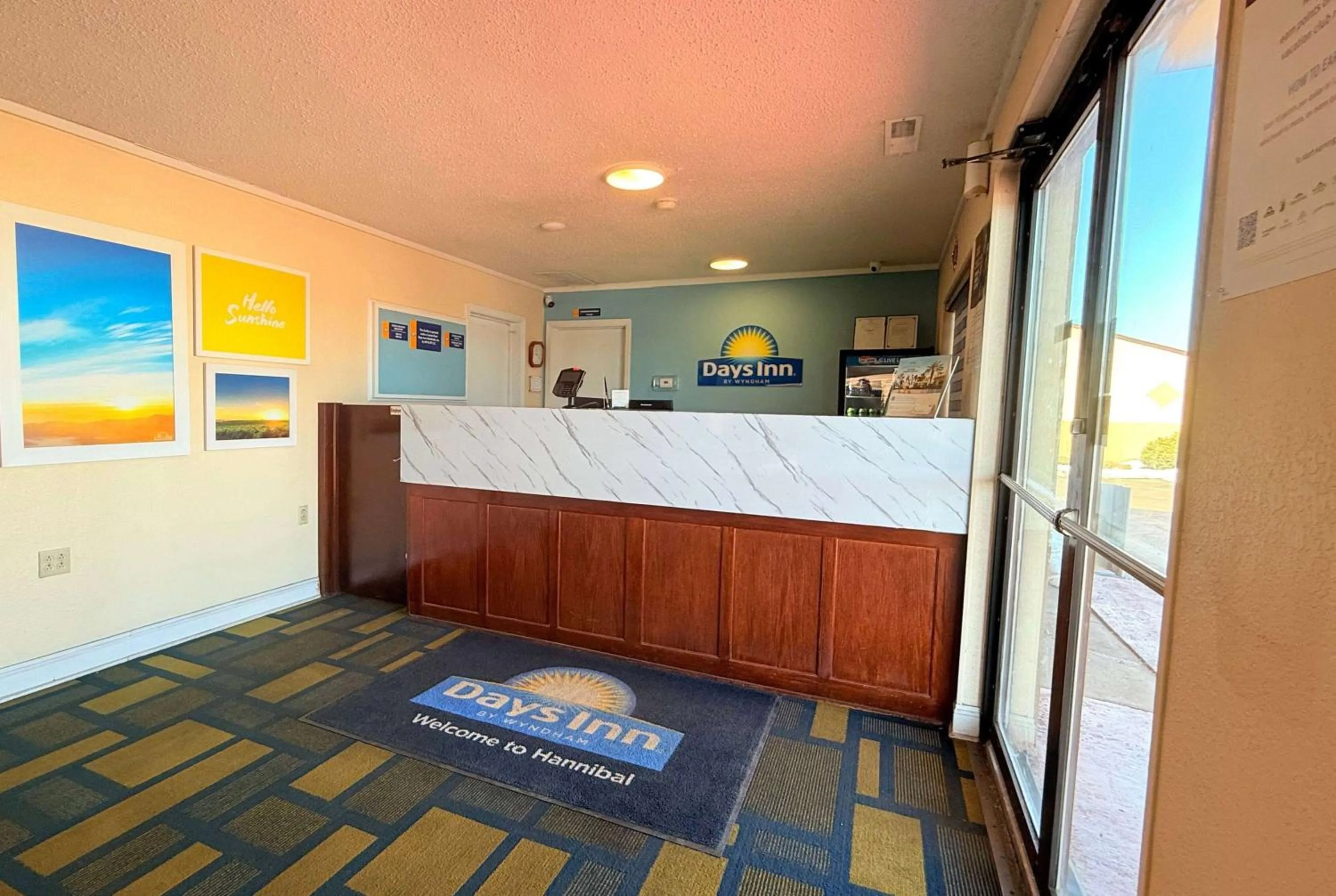 Lobby or reception in Days Inn by Wyndham Hannibal
