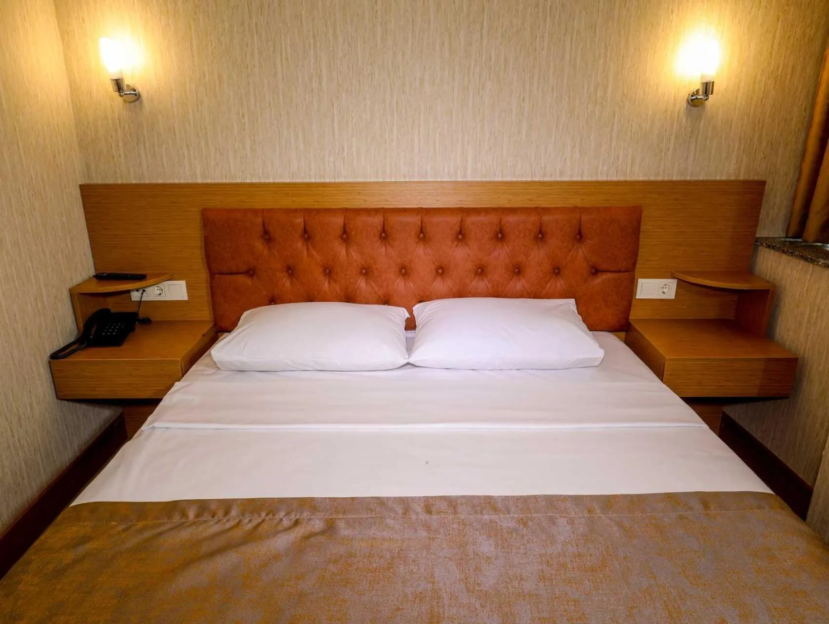 Bedroom in Grand Elmira Suites