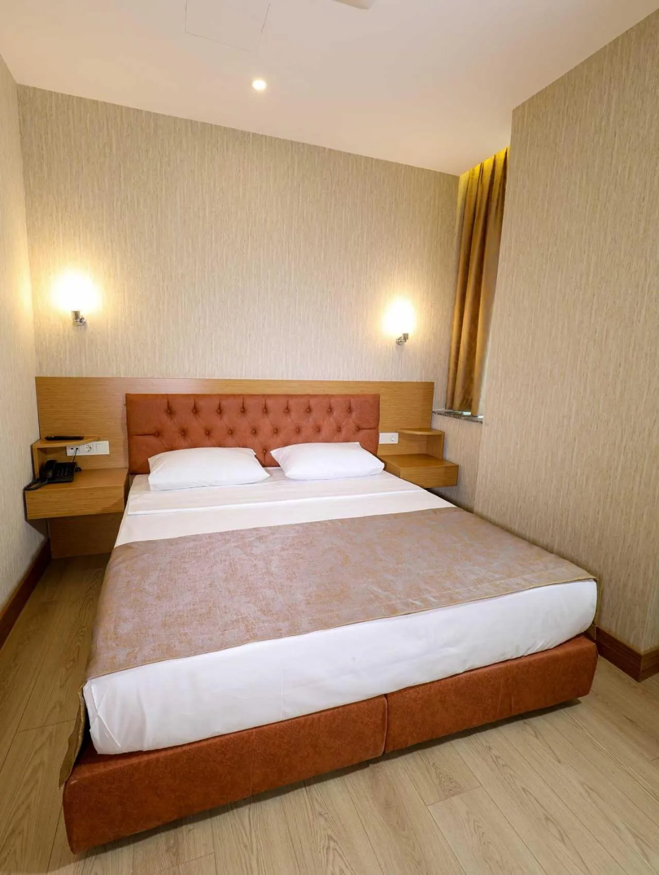 Bedroom in Grand Elmira Suites