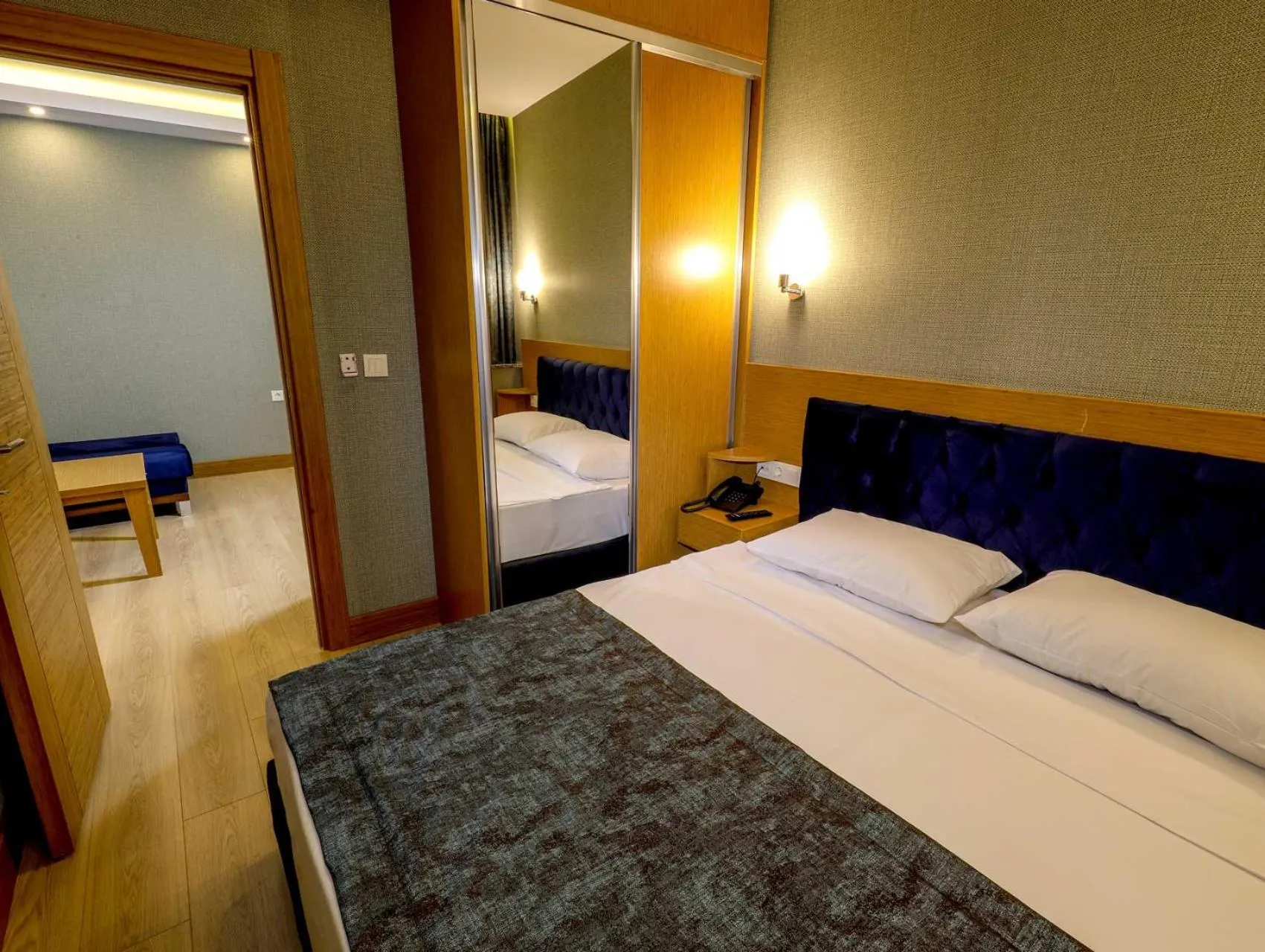 Bedroom in Grand Elmira Suites