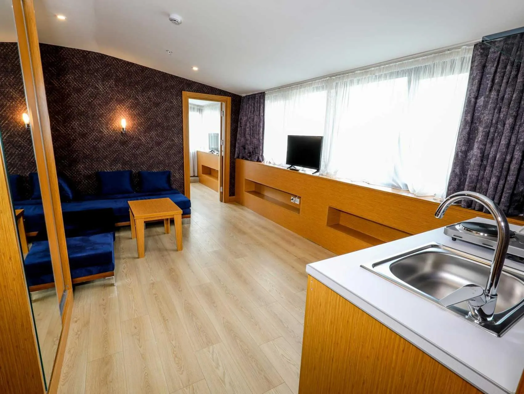 Kitchen or kitchenette in Grand Elmira Suites