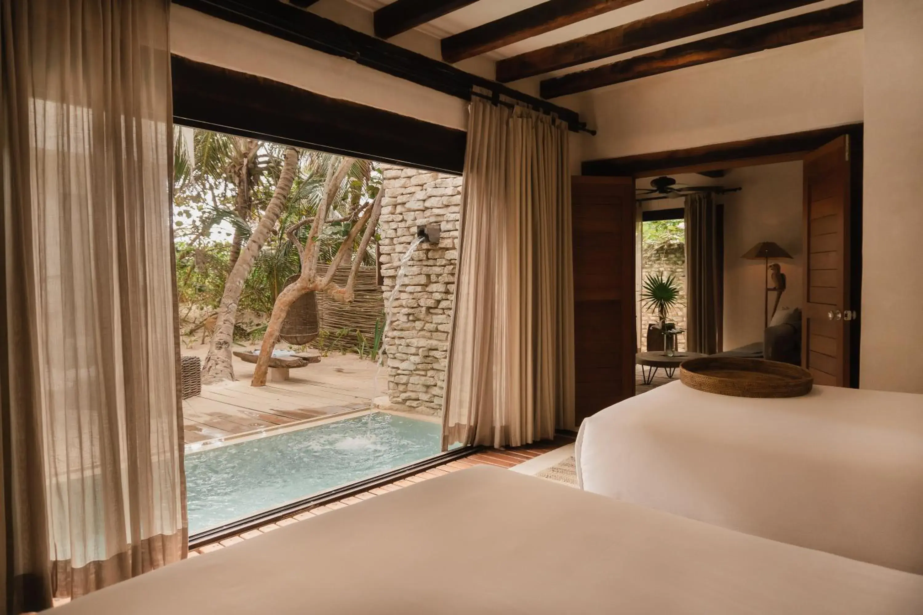 Photo of the whole room, Bed in Aldea Canzul Tulum