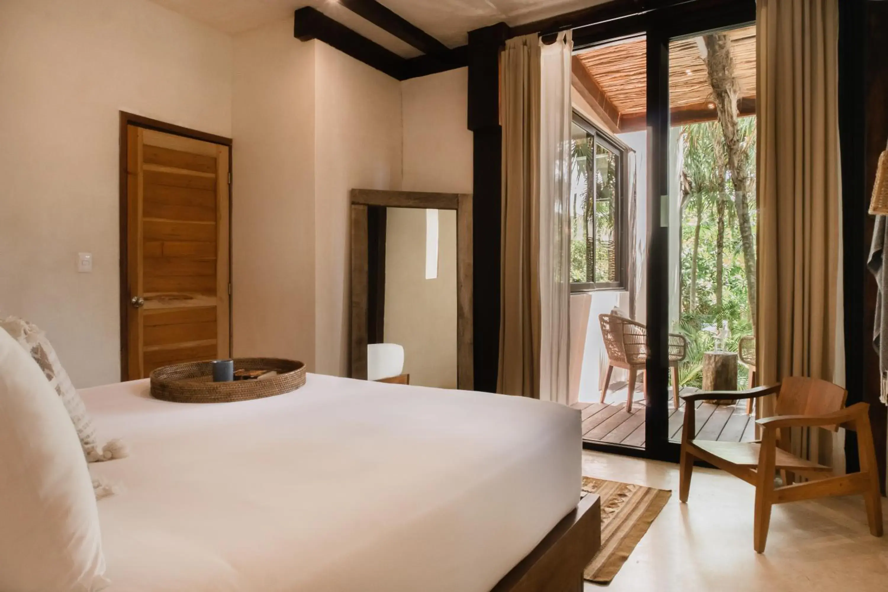 Photo of the whole room, Bed in Aldea Canzul Tulum