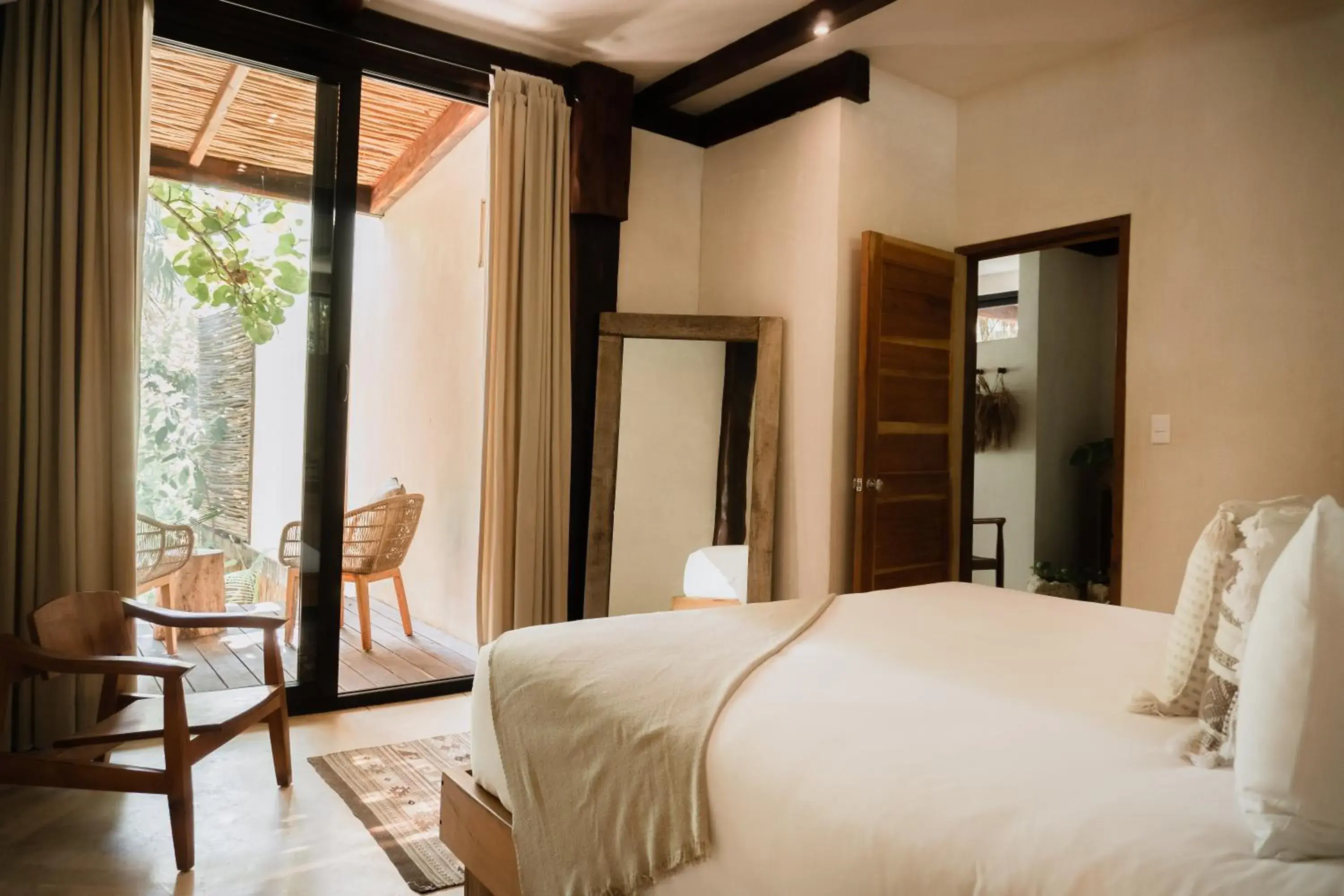 Photo of the whole room, Bed in Aldea Canzul Tulum