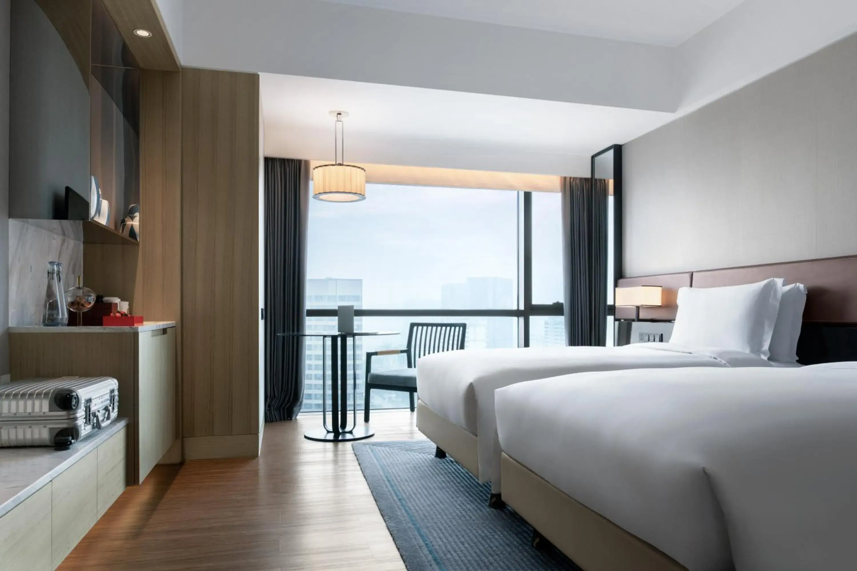 Bed in New World Langfang Hotel Bed in New World Langfang Hotel