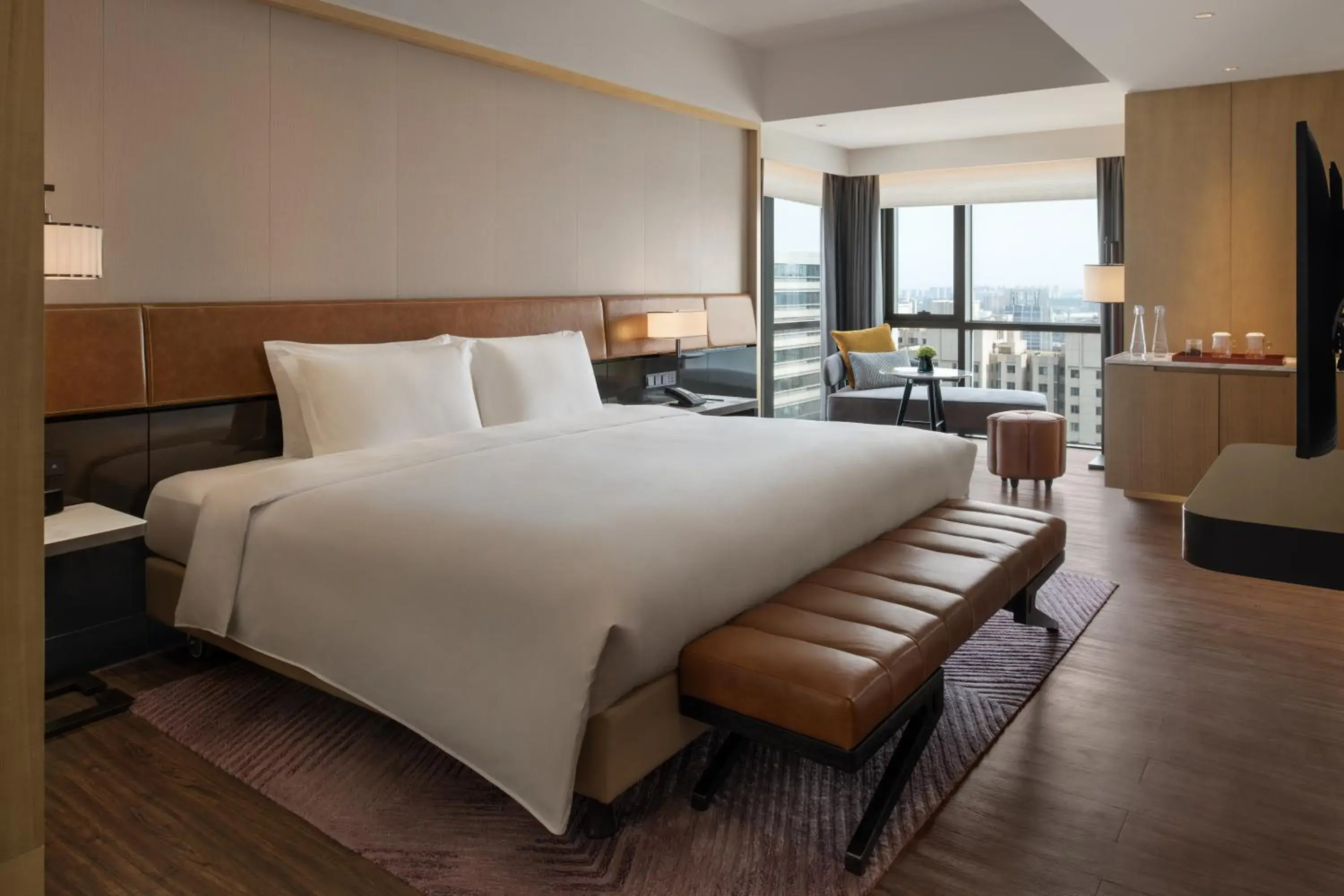 Bed in New World Langfang Hotel Bed in New World Langfang Hotel