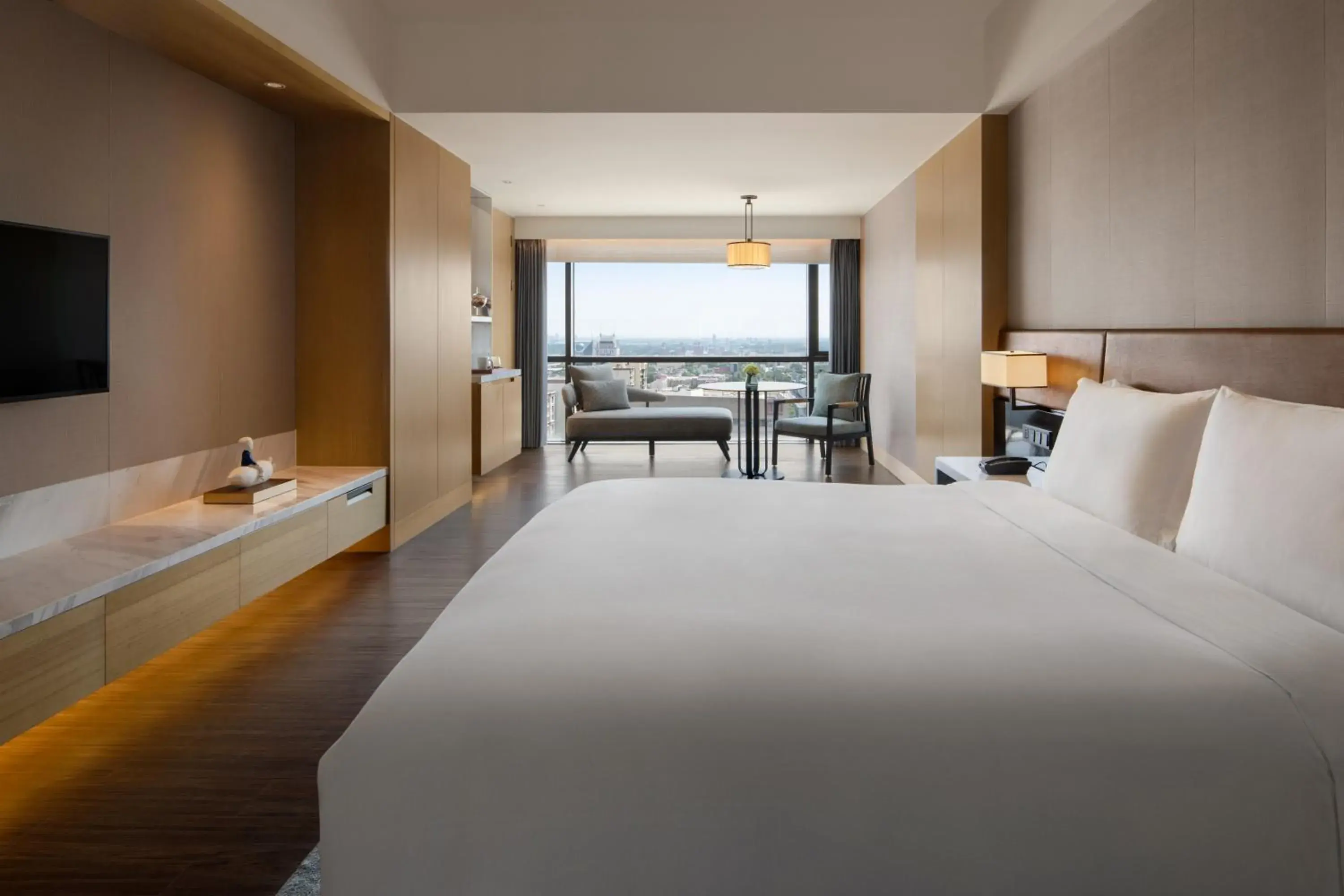 Bed in New World Langfang Hotel Bed in New World Langfang Hotel