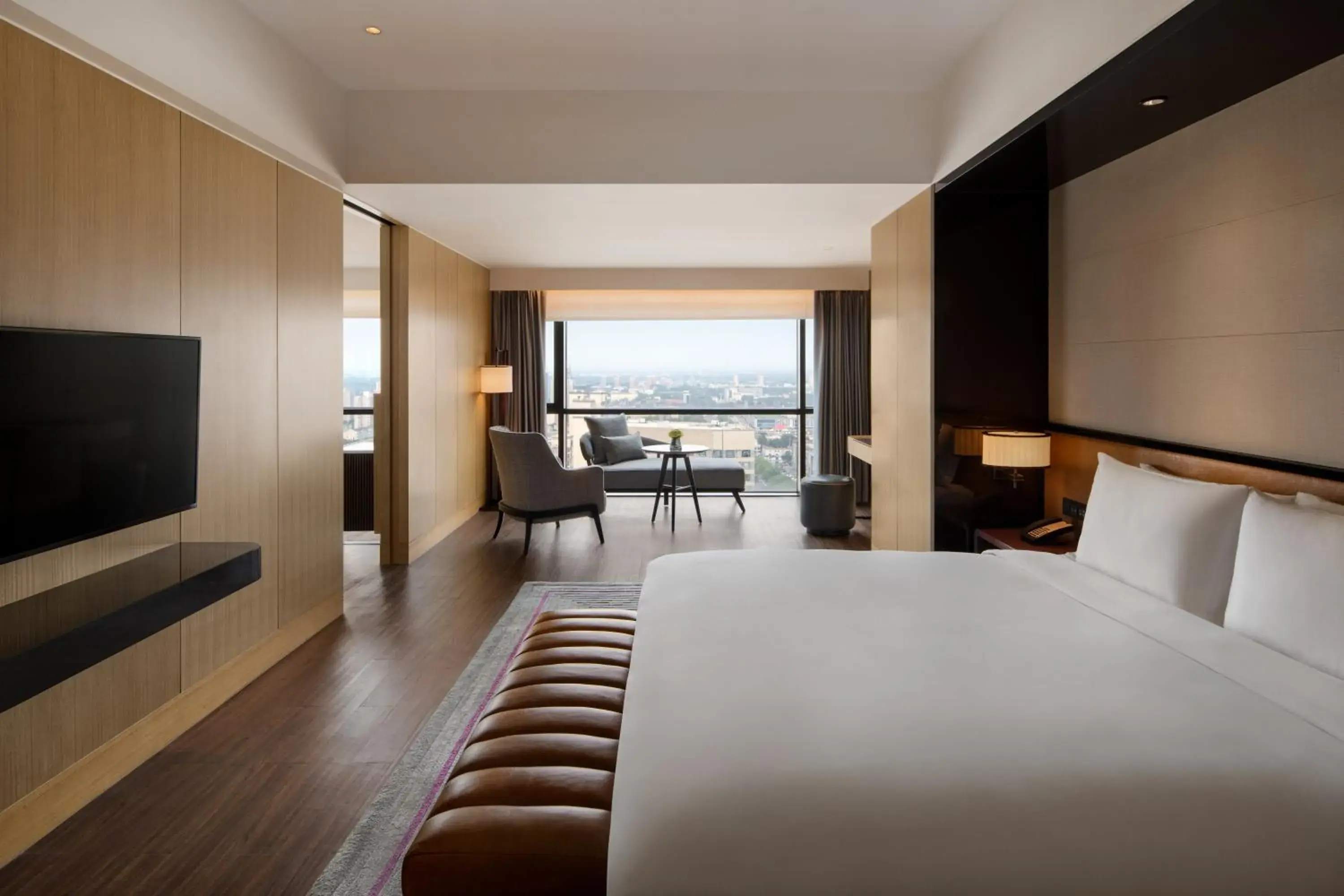 Bed in New World Langfang Hotel Bed in New World Langfang Hotel