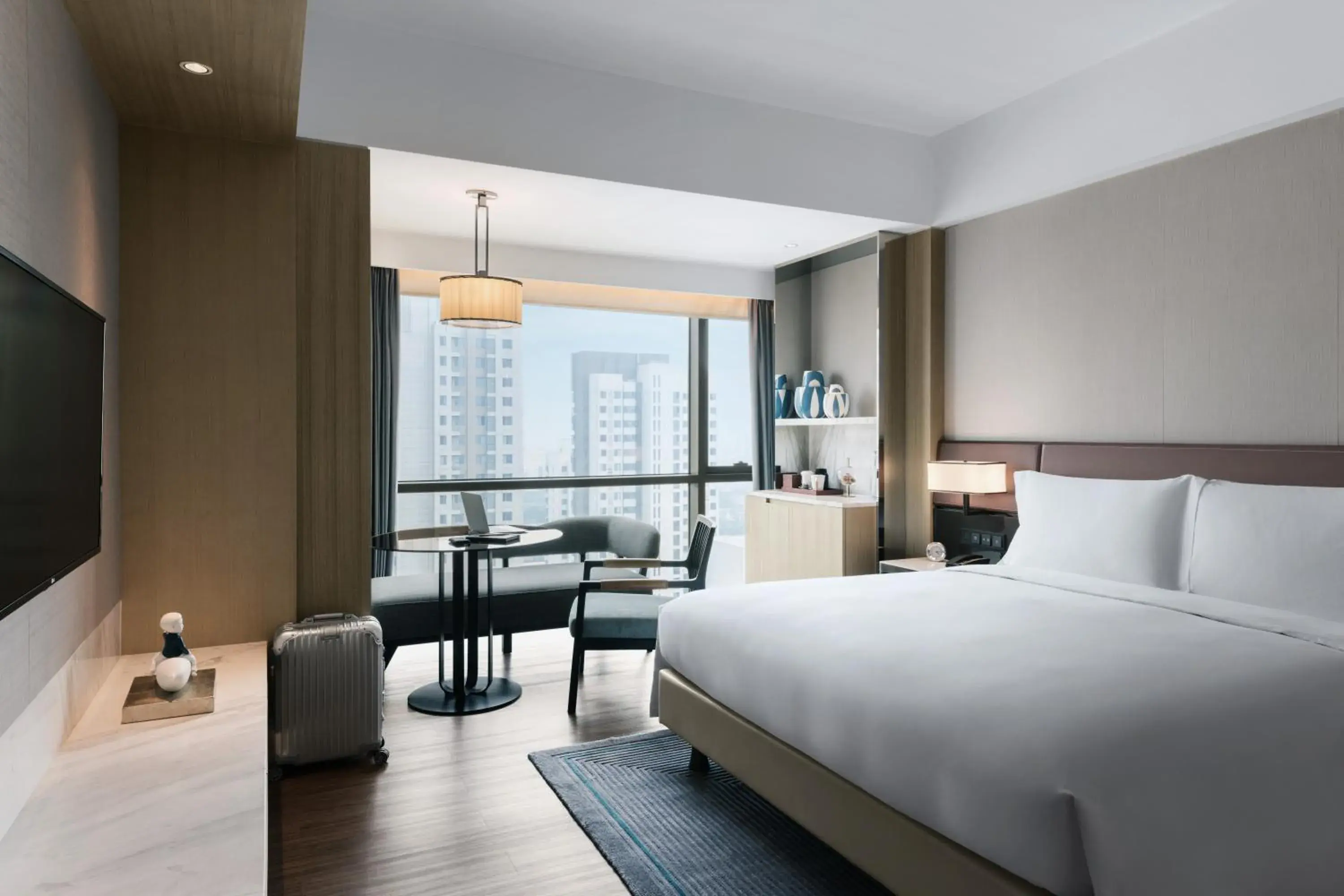 Bed in New World Langfang Hotel Bed in New World Langfang Hotel