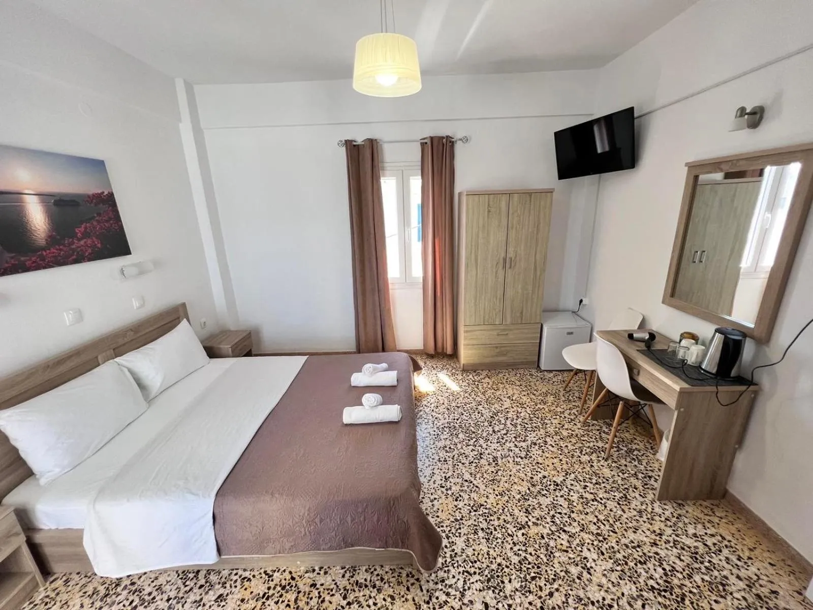 Bed in Firaxenia rooms