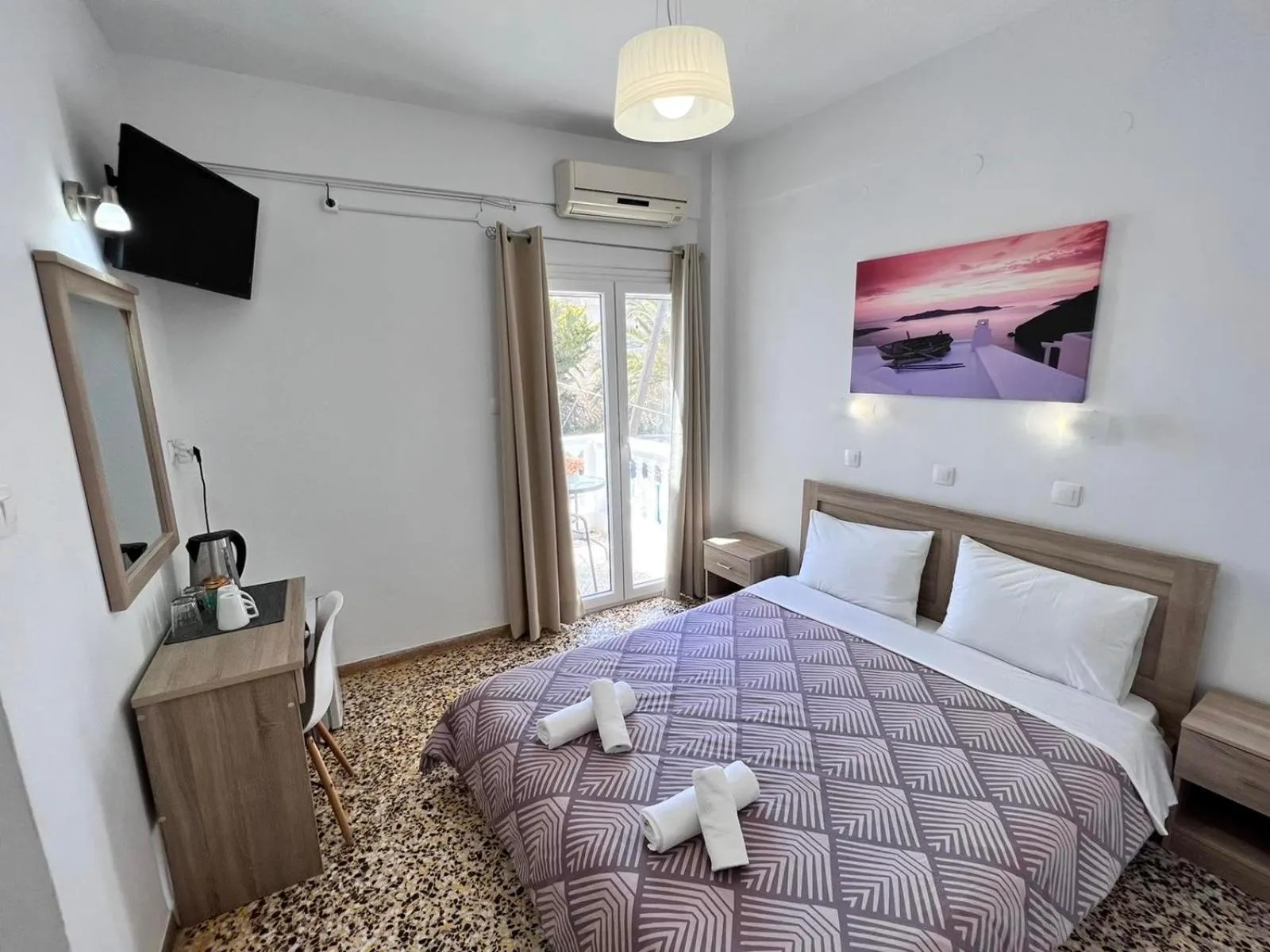 Bed in Firaxenia rooms