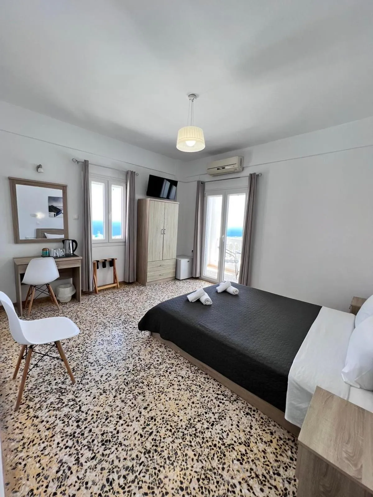 Bed in Firaxenia rooms