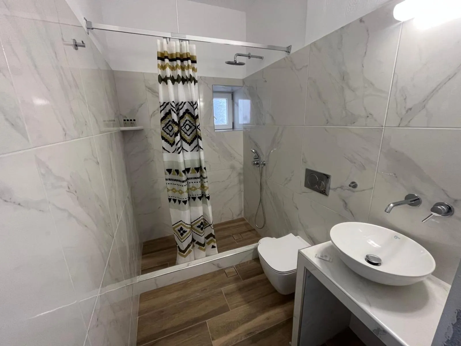 Shower in Firaxenia rooms
