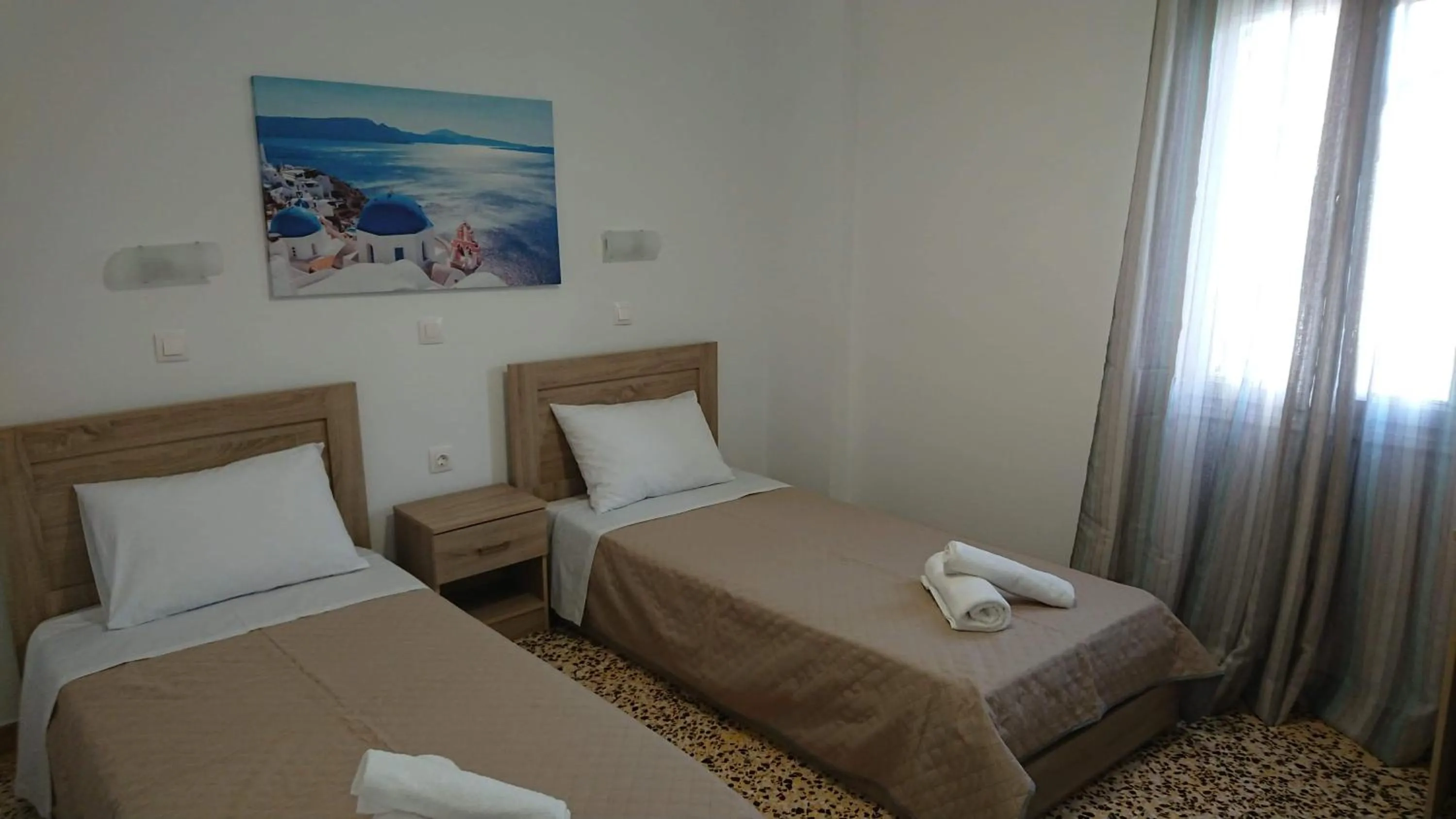 Bed in Firaxenia rooms